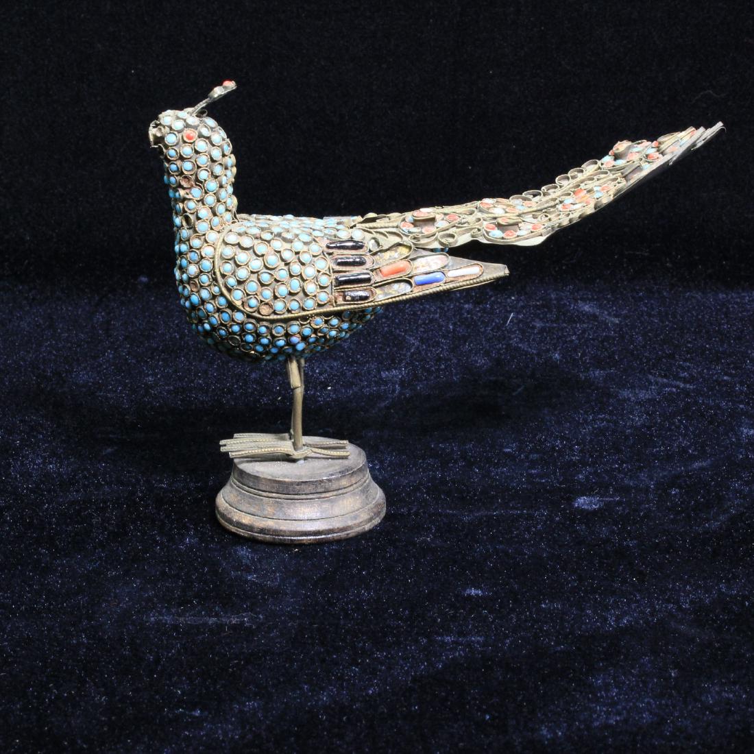 Thai Brass Bird with Coral and Turquoise: Description: Antique Thai brass bird applied with genuine stones of turquoise and coral Condition: Damaged, beads missing, beak missing Shipping Detail: Approximate carton dim