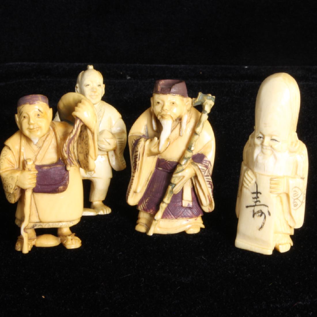 C. 1900 Japanese Ivorie Netsuke Figurines: Estimate: $250-$325 Description: Antique Japanese Netsuke polychrome carvings depicting Immortals. Made from whale's teeth and boar's tusk ivories. Signatures noted on 3 of the 4 carvings. <