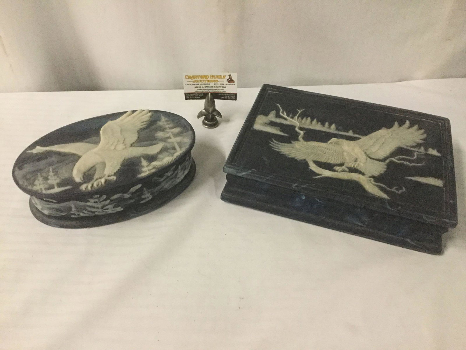 2 modern blue incolay stone jewelry boxes with sculpted: Two modern blue Incolay Stone jewelry boxes with bas-relief sculpted eagle designs from Incolay Studios Inc., lot includes info on materials, larger piece is approx. 12x9x4 inches. JRL