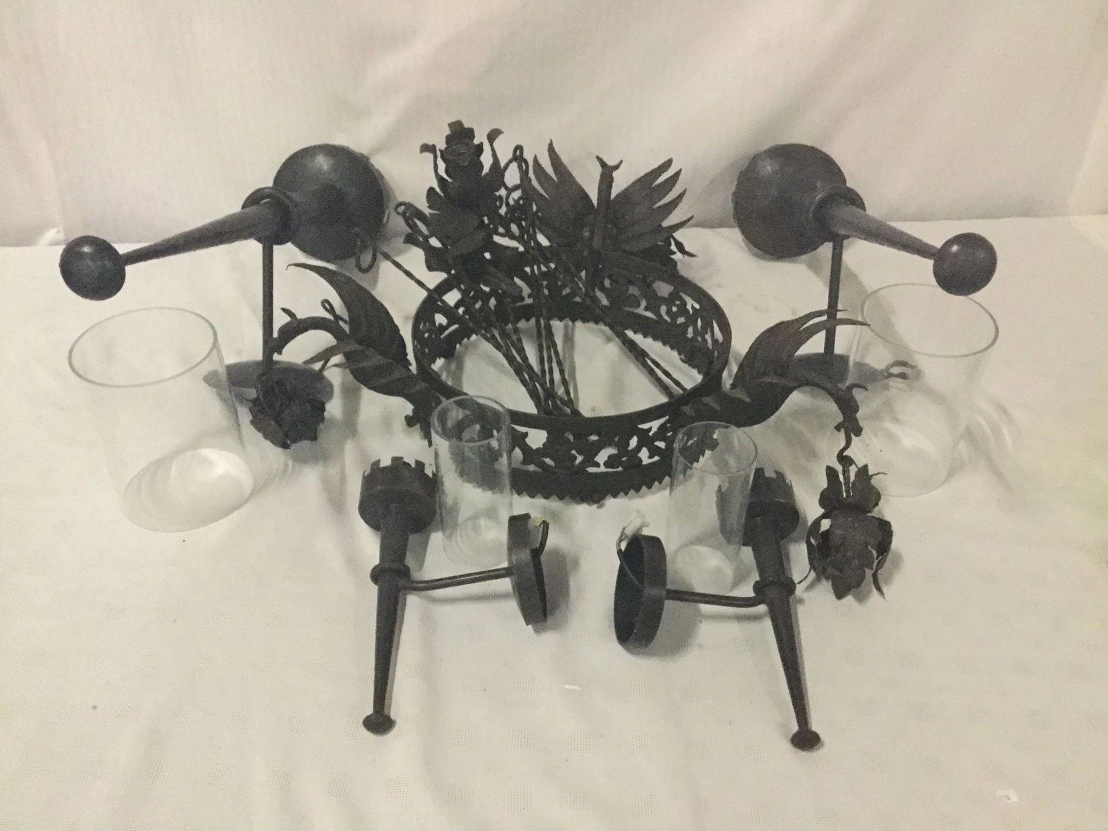 Iron dragon chandelier with wall mount lighting.: Iron dragon chandelier with wall mount lighting. Chandelier measures approx 25x25x9 inches.