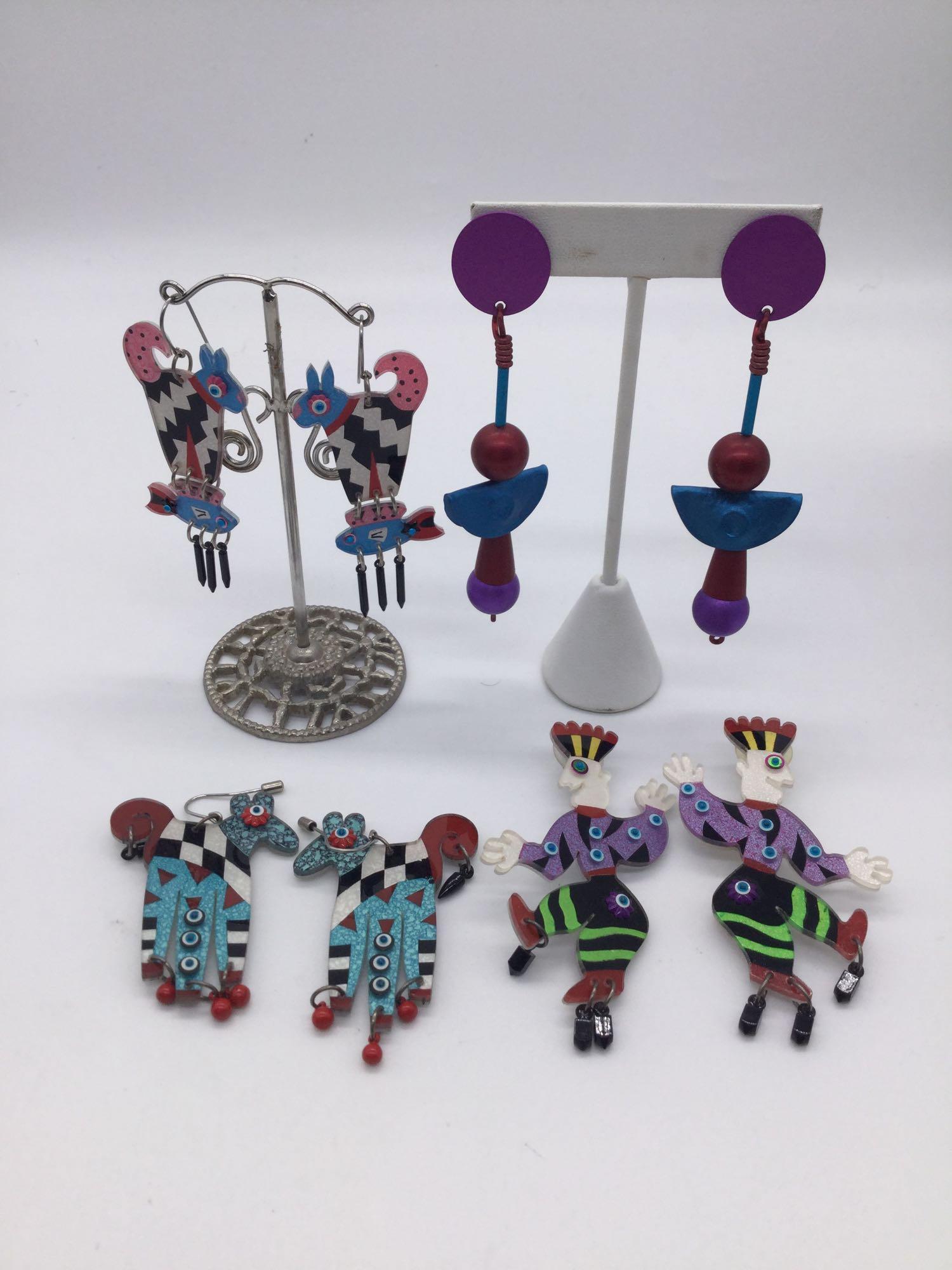 Four pairs of vintage 80s art jewelry earrings. Largest: Four pairs of vintage 80s art jewelry earrings. Largest approx 3.5x1 inch.