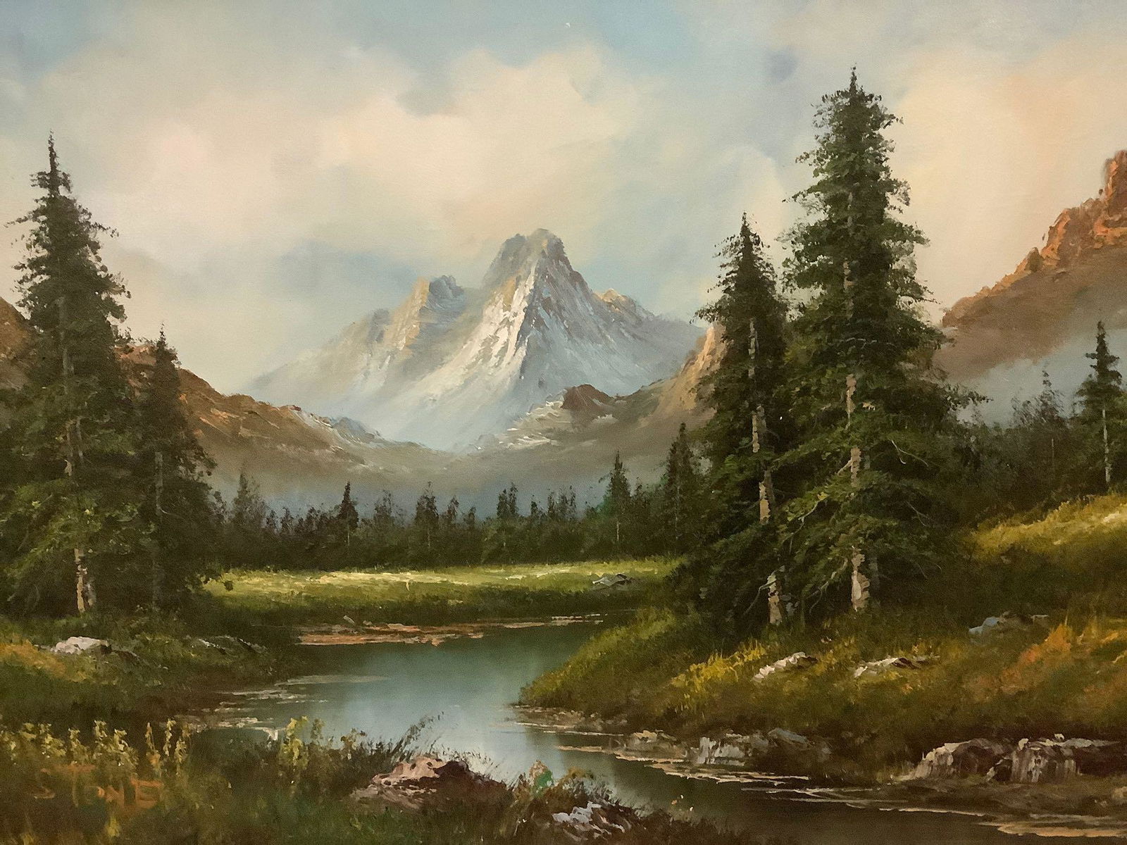 Framed original mountain / nature scene oil painting: Framed original mountain scene oil painting signed by artist Stone, approx 43x31 inches. Steep mountains overlooking stream cutting through evergreen forest in natural green/brown/blue tones.