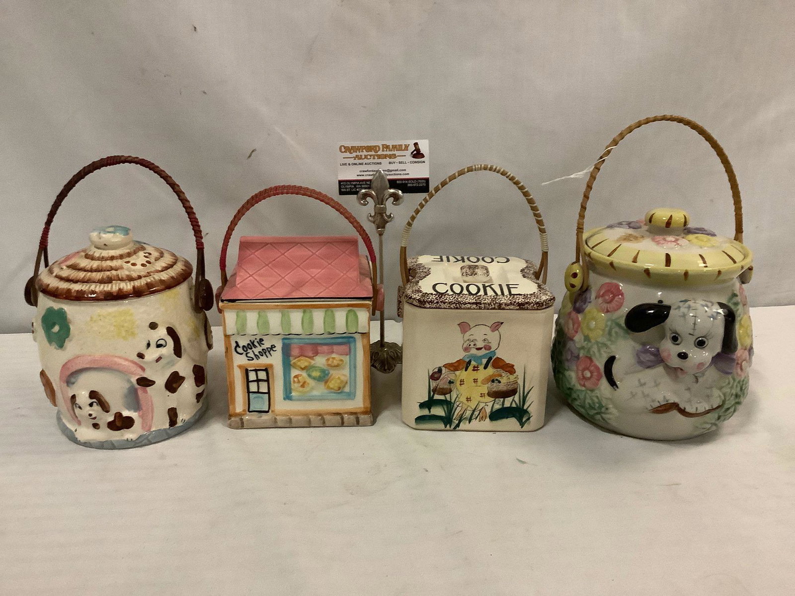 4 vintage cookie jars/biscuit baskets. 1 Hammer: Collection of 4 vintage cookie jars. 1 Hammer Brothers (New York / Japan), others unmarked. Largest approx 7x7x7 inches.