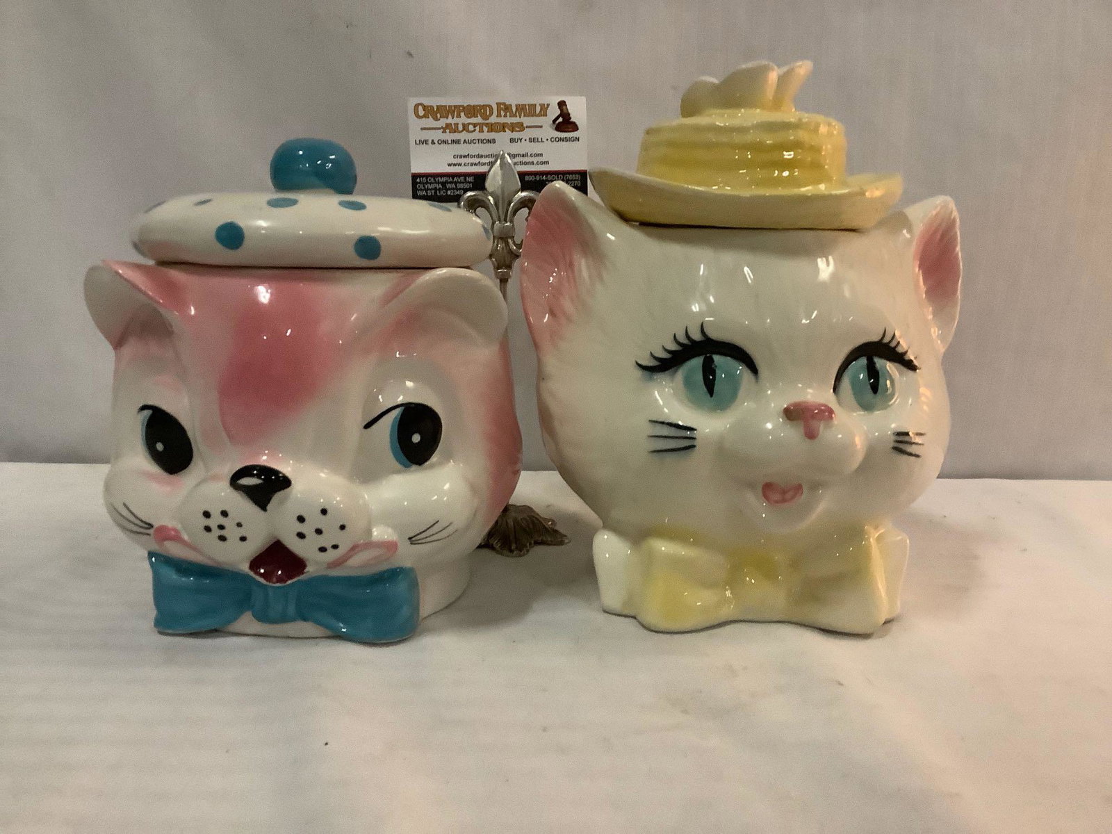 Pair of vintage handpainted kitty cat cookie jars, one: Pair of vintage kitty cat cookie jars, one Grantcrest. Largest Approx 10x8x7 inches.