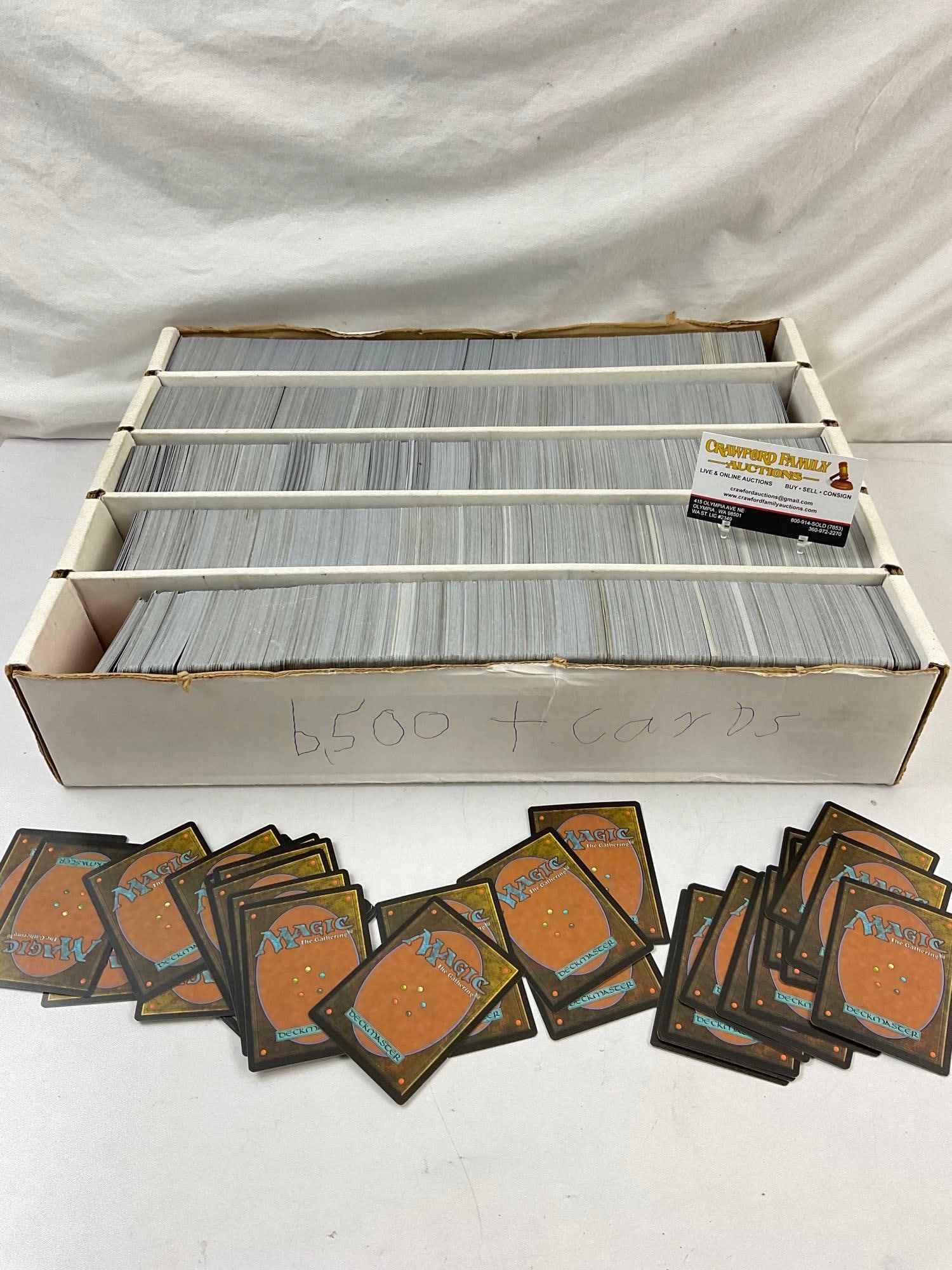 6500+ Magic the Gathering Cards. Unresearched, lightly used. See pics.: 6500+ Magic the Gathering Cards. Unresearched, lightly used. Measures 19" x 14". Conditions are fair to good. DM-822