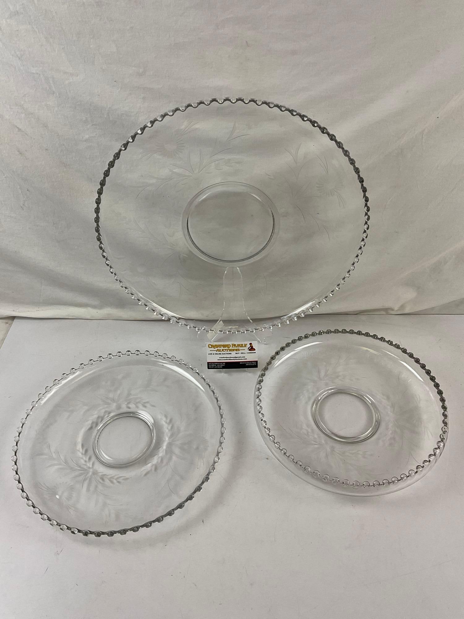 3 pcs Vintage Round Clear Hobnail Glass Serving Bowls w/ Etching of Flowers. See pics.: 3 pcs Vintage Round Clear Hobnail Glass Serving Bowls w/ Etching of Flowers. Possibly Fostoria or Reis Glass, no hallmark. Measures 17" x 2" Condition is fair to good. DM-2620