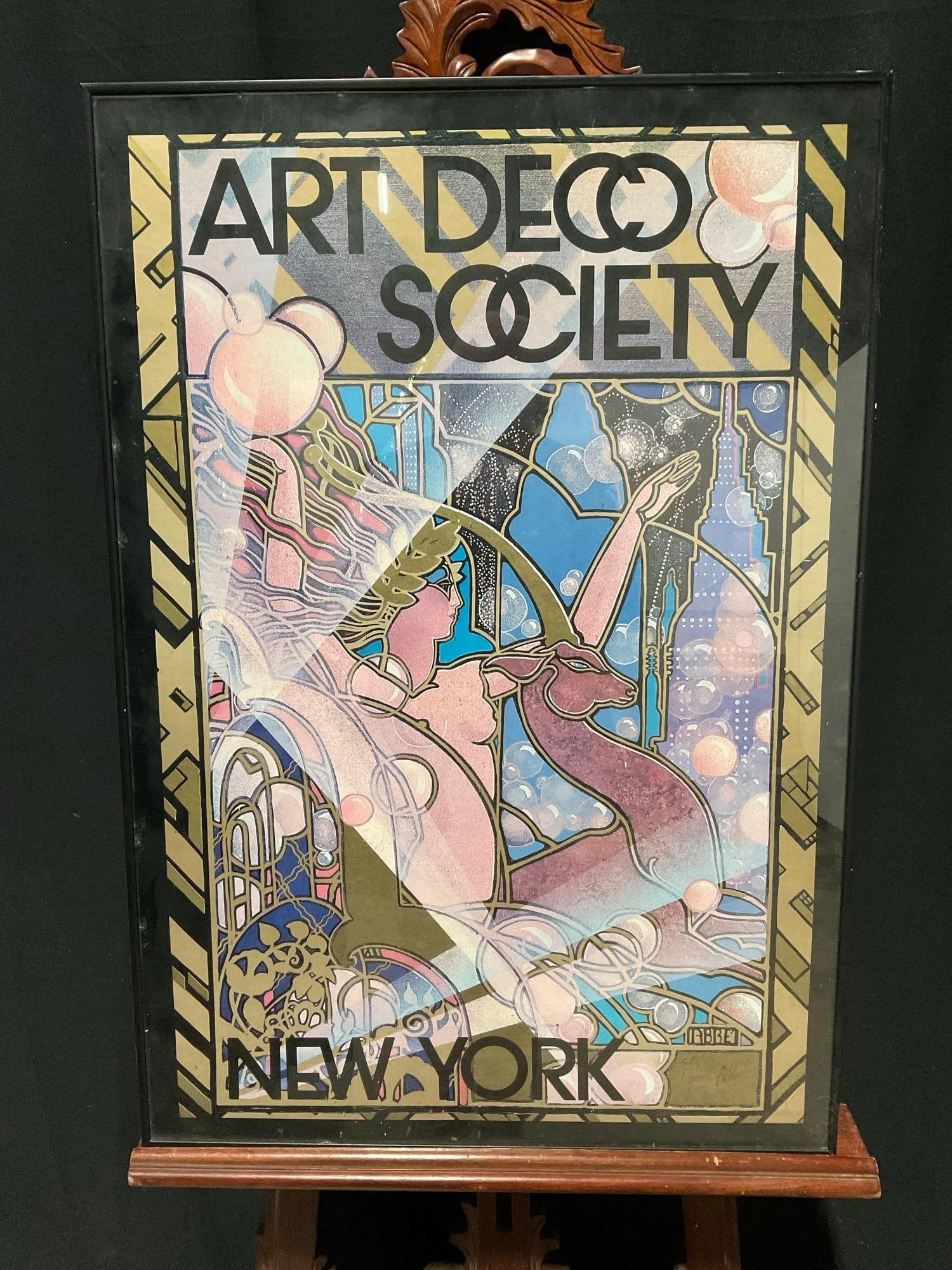 Vintage Framed Art Deco Society New York Poster by Dennis Abbe. Signed by Artist. See pics.: Vintage Framed Art Deco Society New York Poster by Dennis Abbe. Signed by Artist, dated 6/12/82. In black metal frame with glass pane. Frame has some scratches, glass has some chips. Condition is fair