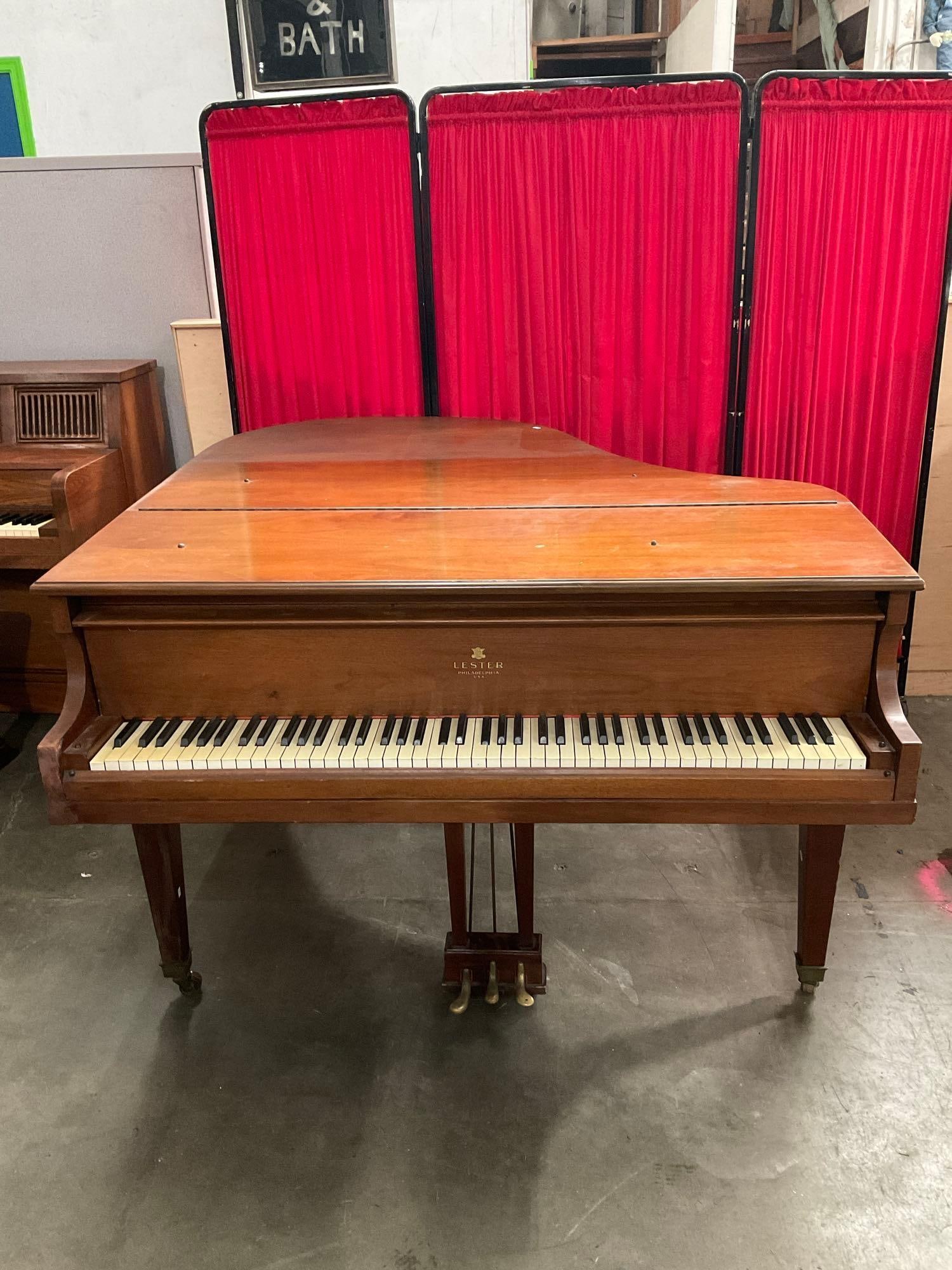 Vintage Lester Piano Co. Wheeled & Wooden Piano No. 98621. Measures 56" x 39" See pics.: Vintage Lester Piano Co. Wheeled & Wooden Piano No. 98621. Measures 56" x 39" shows some wear consitent with use. Some keys are chipped. Cosignor say he will deliver locally for 150.00 