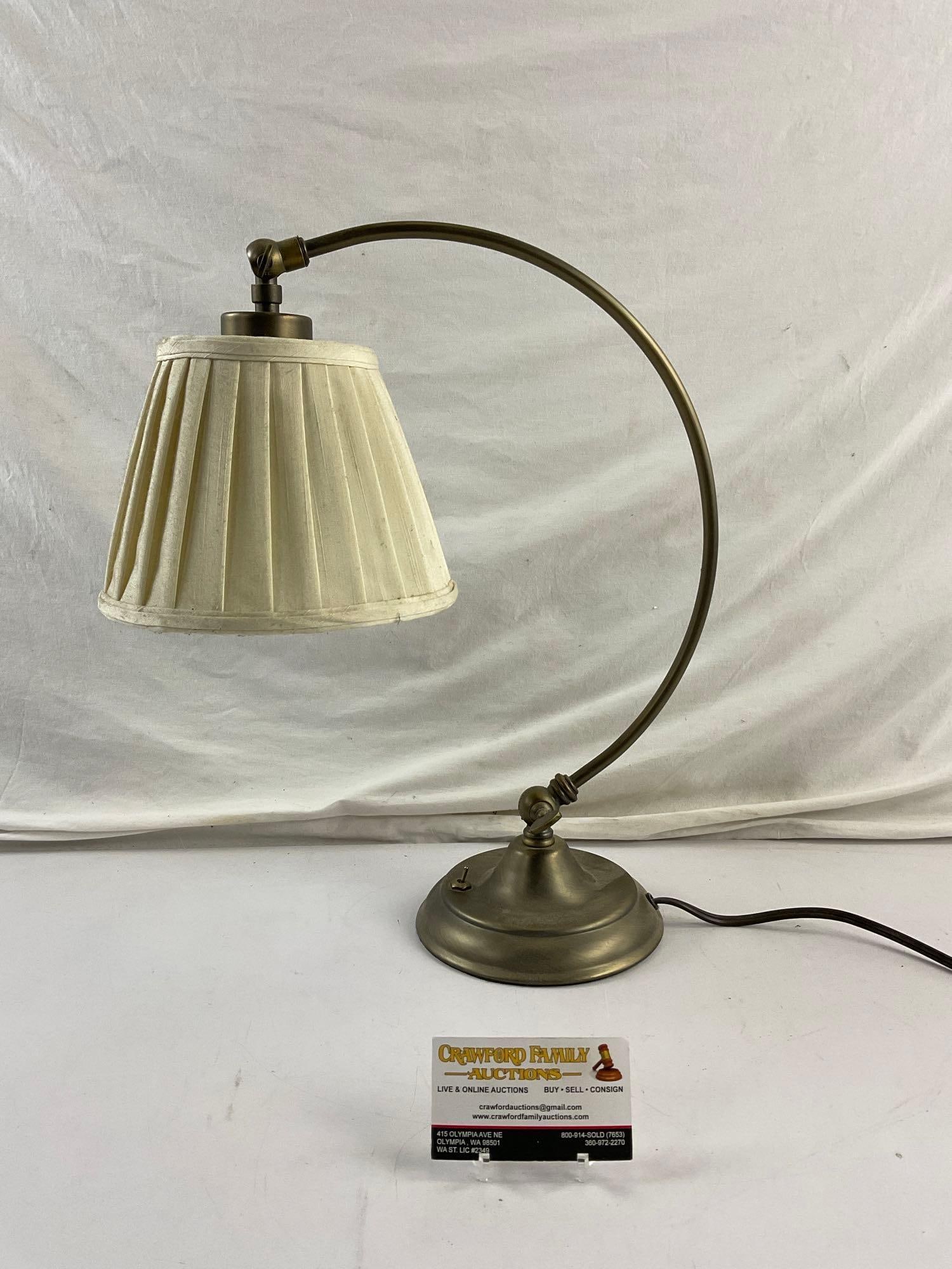 Curved Brushed Brass Desk Lamp w/ Cream Fabric Shade. Tested, works. See pics.: Curved Brushed Brass Desk Lamp w/ Cream Fabric Shade. Tested, works. Measures 17.5" x 13" Condition is fair to good. DM-414