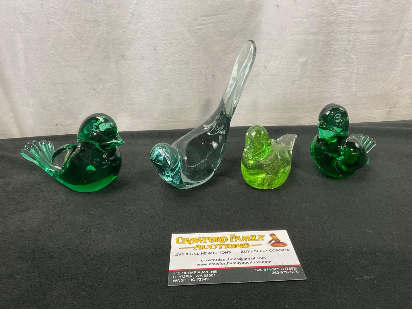 Collection of 4 Art Glass Bird Figures, 1x Marked Fenton, Dark Green, Yellow-Green, Clear Blue: Appears to be in good shape. The tallest piece measures approx 5 inches long. See pics. E-2643