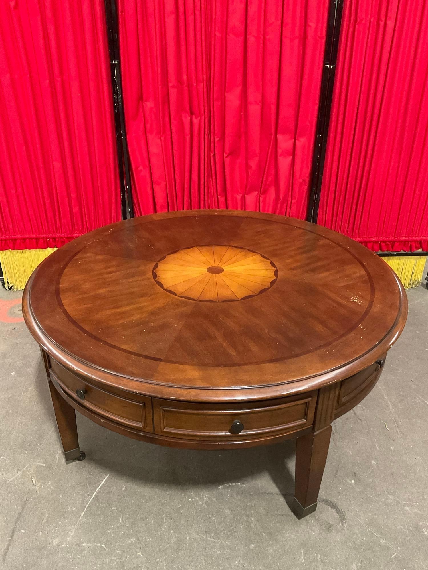 Modern Round Cherry Finish Wooden Wheeled Coffee Table w/ 4 Drawers & Sunburst Inlay. See pics. (1 of 5)