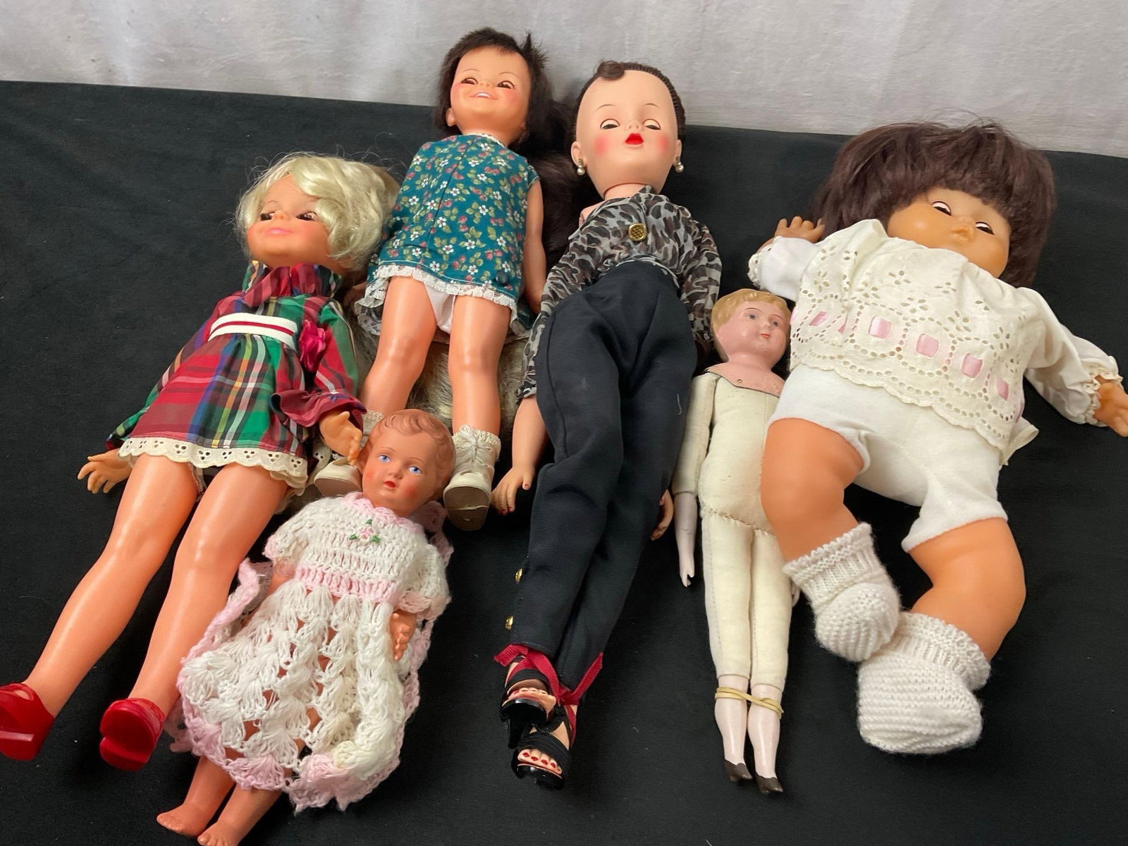 6 Vintage Dolls, few by Ideal, Minerva German Doll, and more: Appears to be in good shape, one of the piece has the elastic broken, so the pieces fall apart. The larger piece measures about 14 inches tall. See pics. E-2617