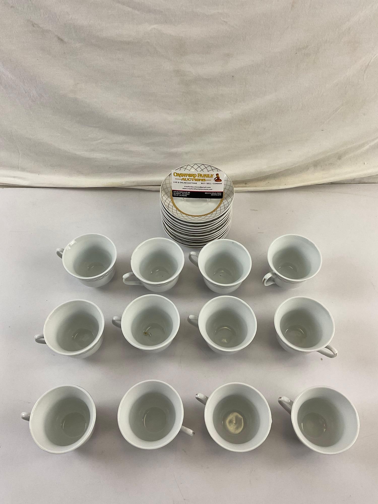 24 pcs SMCS Porzellanfabrik German China Tea Set. White & Gold. See pics.: 24 pcs SMCS Porzellanfabrik German China Tea Set. 12 cups, 12 saucers. Condition is fair to good. Measures 13" x 7.5" DM-2517