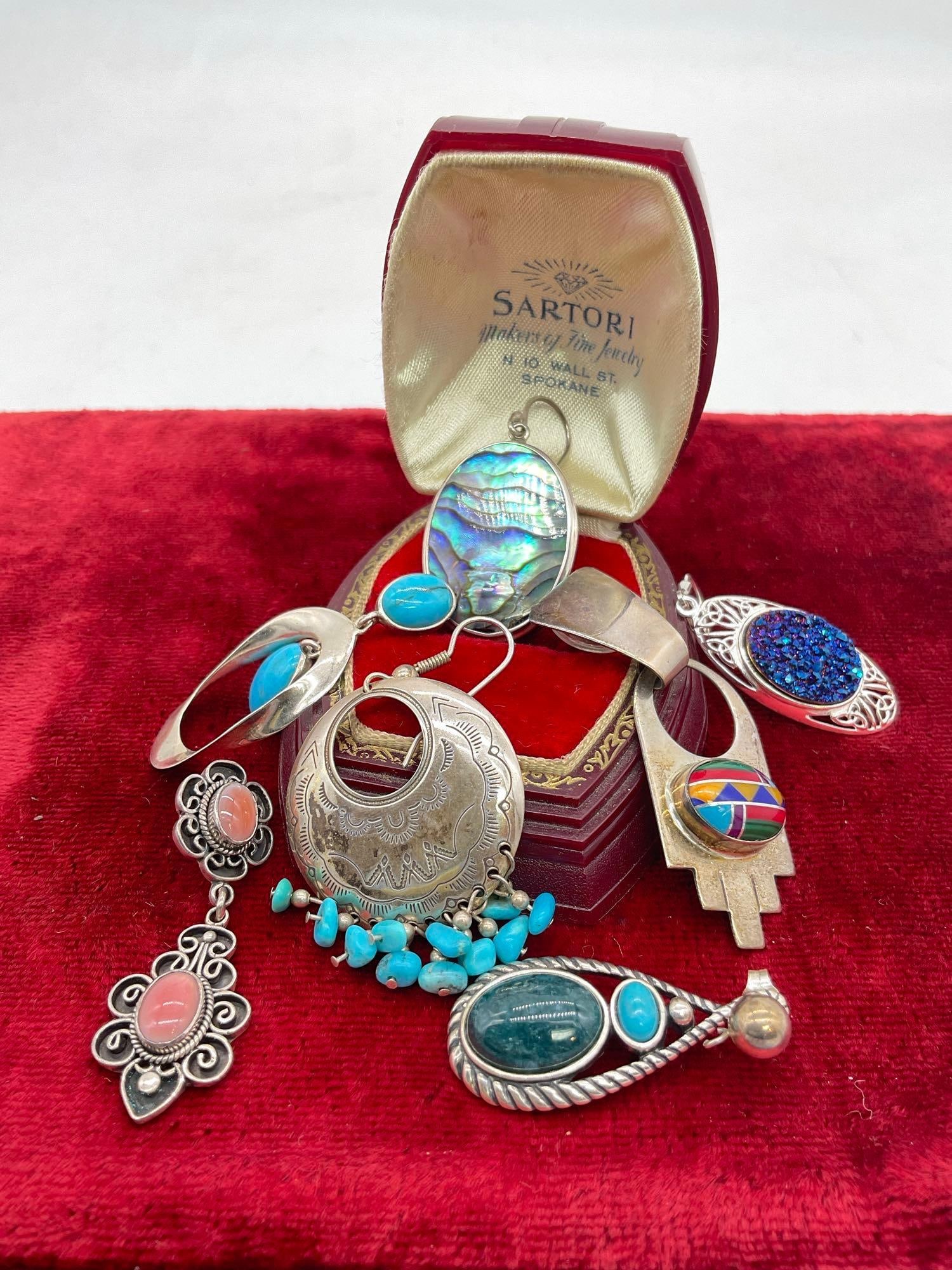Selection of single mismatched sterling silver earrings incl. native American signed pcs (1 of 4)