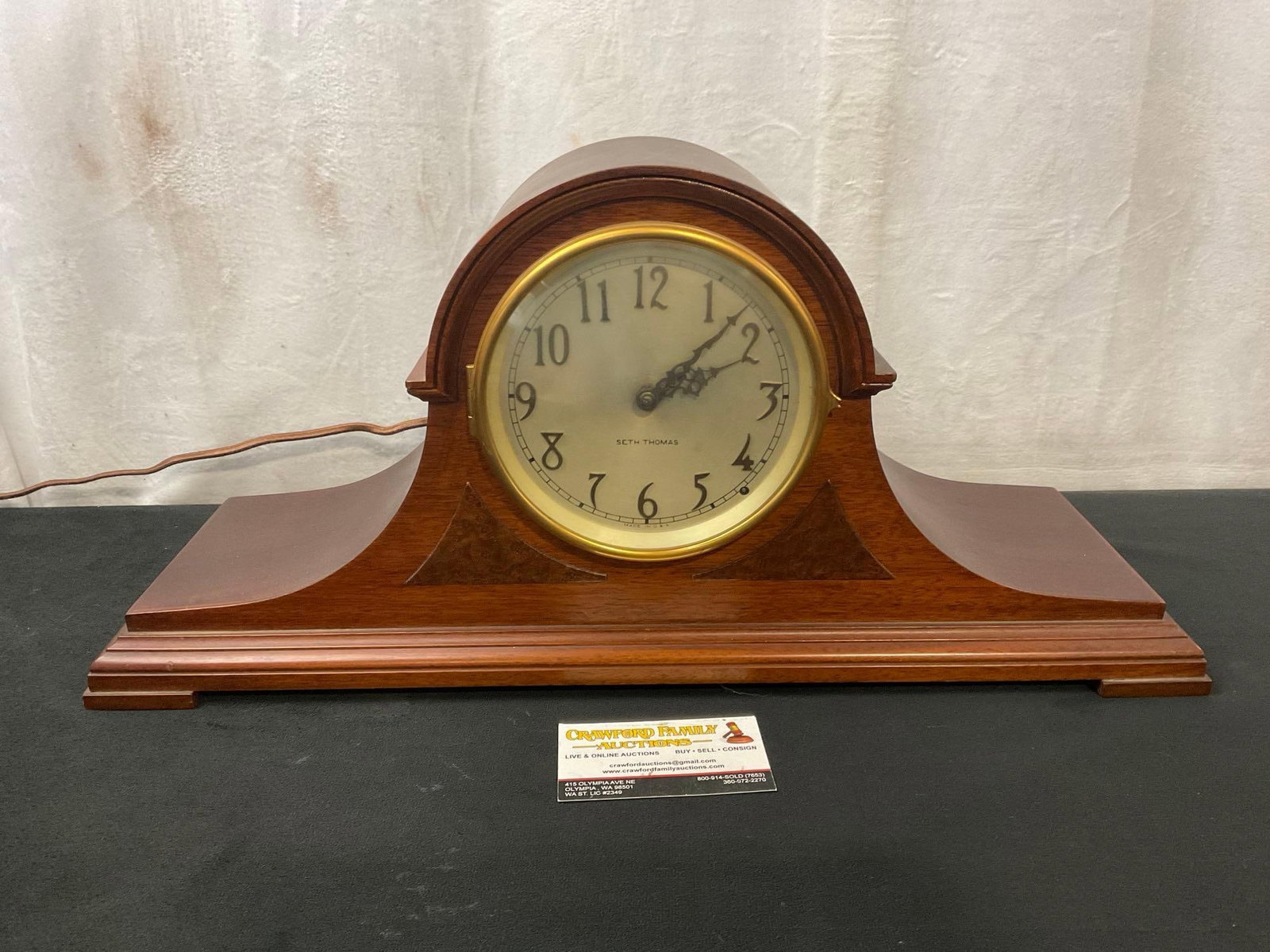 Vintage Electric Seth Thomas Wooden Mantel Clock: Has a small crank to set the time. Appears to be in good shape. Measures 9.5h x 20.5w x 6d inches. See pics. E-2657