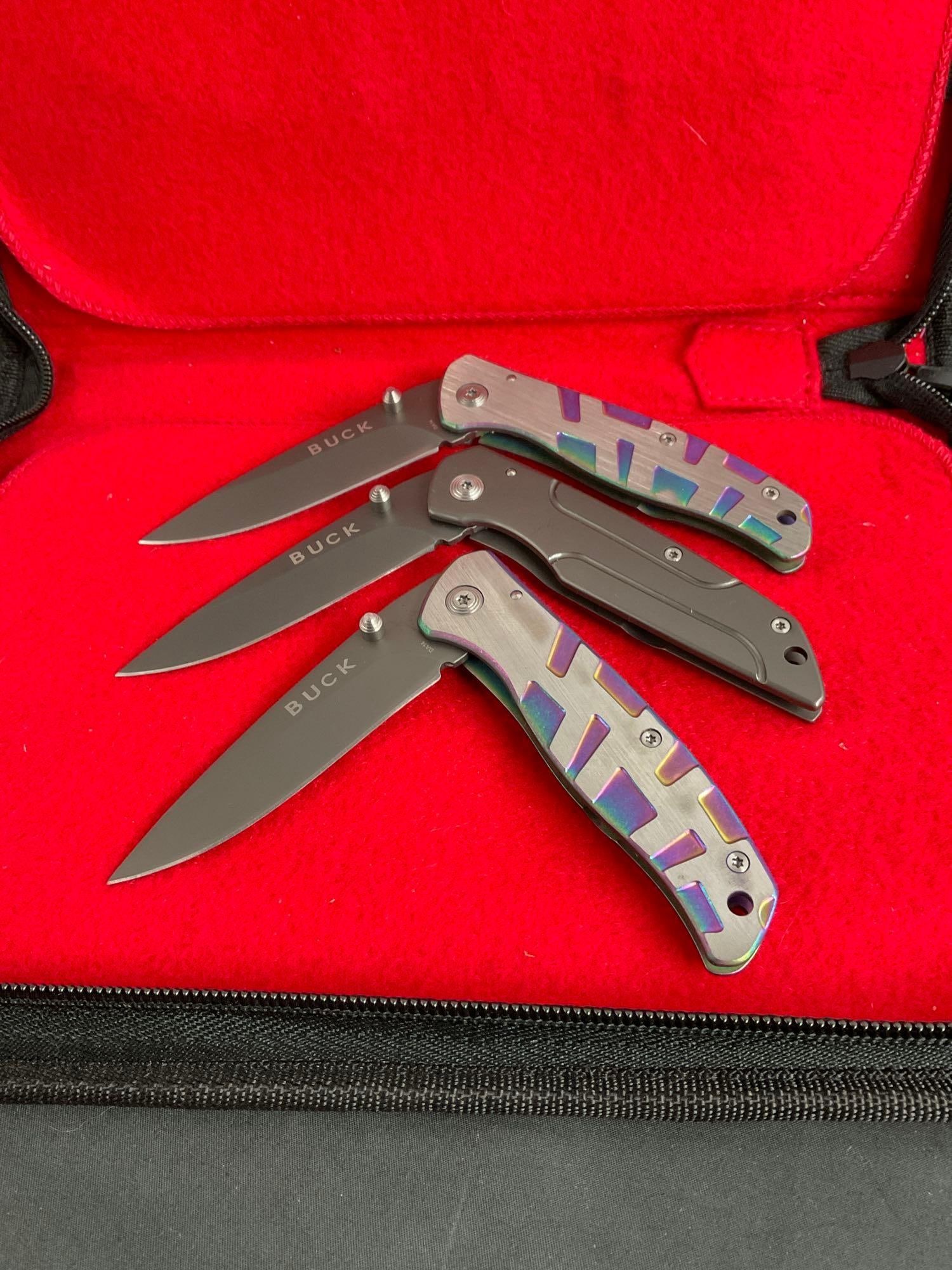 3x New in Box Buck Folding Pocket Knives - 2 in Chromatic motif. All blades are 3" long (1 of 4)
