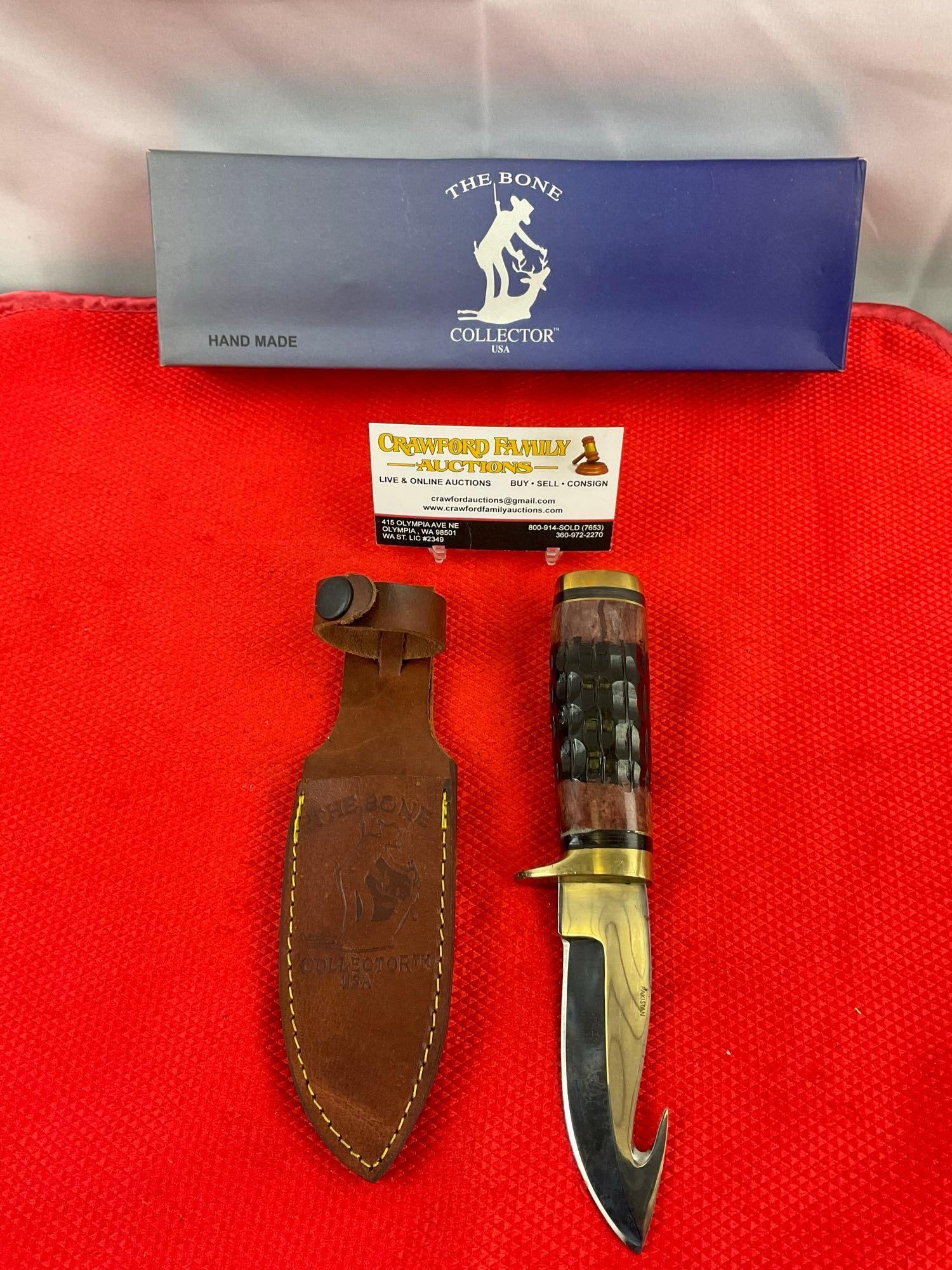 The Bone Collector 4" 440 Steel Fixed Blade Hunting Knife w/ Guthook Model BC-795. NIB. See pics.: The Bone Collector 4" 440 Steel Fixed Blade Hunting Knife w/ Guthook, Bone Handle & Leather Sheath Model BC-795. NIB. Condition is excellent. Measures 10.5" x 3.5" DM-2504
