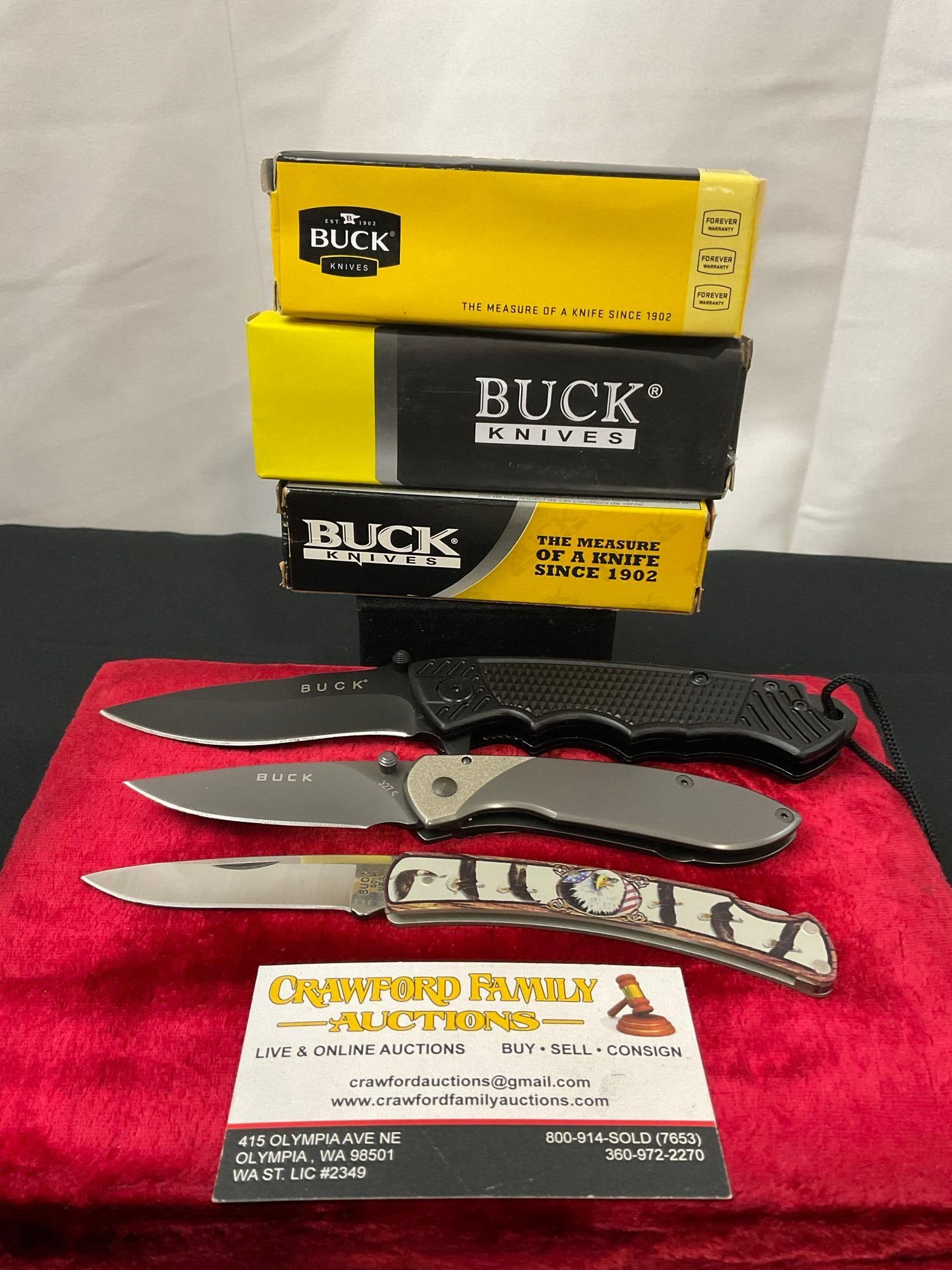 Trio of Buck Folding Pocket Knives, models 327 Nobleman, 501 w/ Patriotic Bald Eagle handle scales (1 of 4)