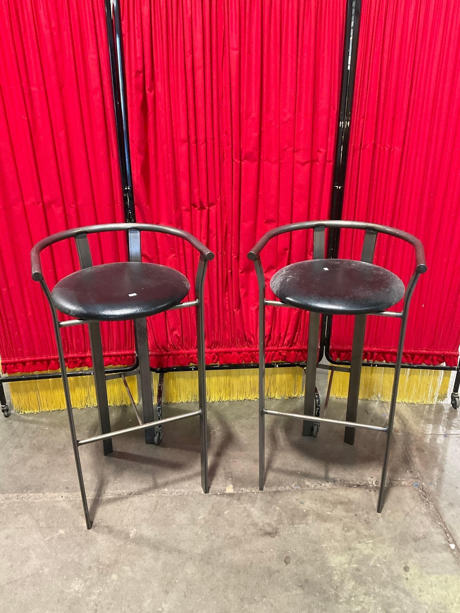 Pair of Vintage Amisco Industries Steel Bar Stools w/ Black Leather Seats & Low Backs. See pics.: Pair of Vintage Amisco Industries Steel Bar Stools w/ Black Leather Seats & Low Backs. Noticeable mildew growth, could be cleaned. Measures 19" x 36" Condition is fair to good. DM-2666