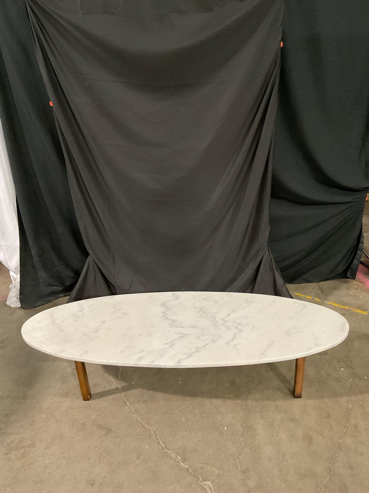 Vintage Low Wooden Coffee Table w/ Long Oval Shaped White Polished Marble Top. See pics.: Vintage Low Wooden Coffee Table w/ Long Oval Shaped White Polished Marble Top. Measures 72" x 15" Condition is fair to good. DM-2660