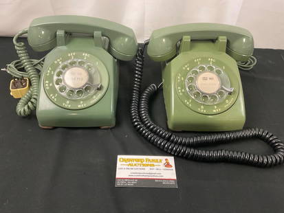 Pair of Vintage Rotary Phones, Olive Green in Color, Bell System by Western Electric: Appears to be in good shape, one of the phones has a cracked section below where the handset sits. The pieces measures approx 5h x 8w x 9d inches. See pics. E-2684 
