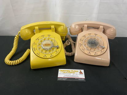 Pair of Vintage Rotary Phones, Yellow & Peach in Color by Western Electric: Appears to be in good shape. The pieces measures approx 5h x 8w x 9d inches. See pics. E-2684 