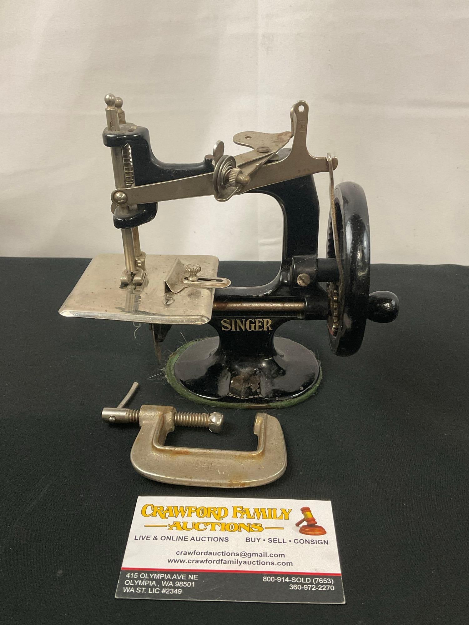 Early 20th Century Singer Mini Childs Sewing Machine, Handcrank, Black in color (1 of 4)