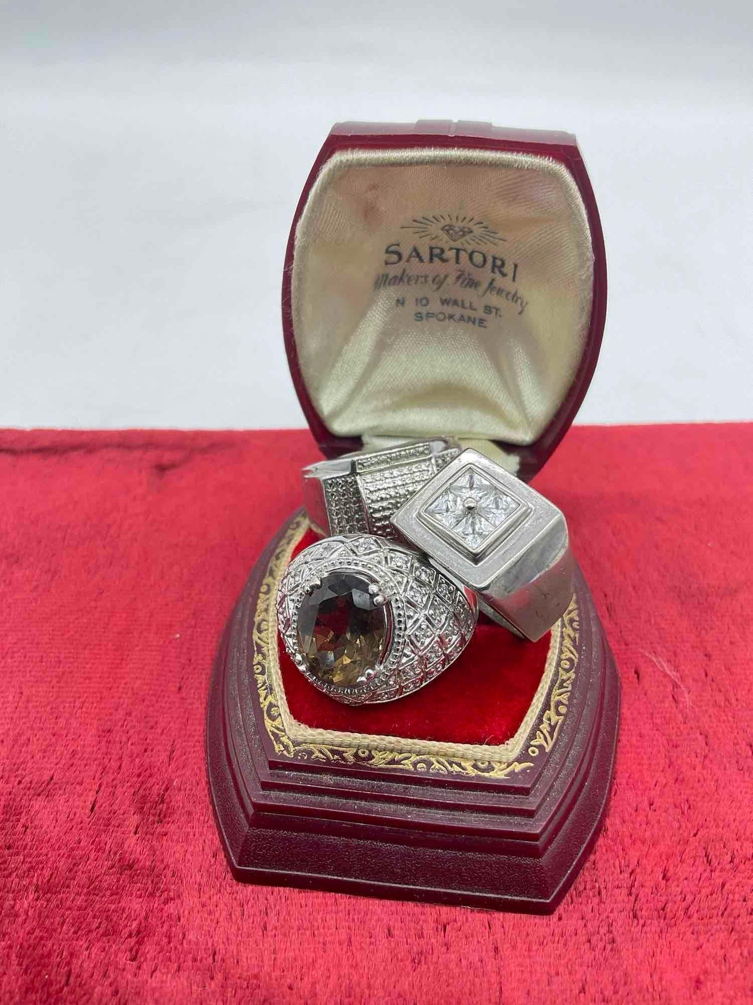 3x sterling silver cocktail rings with intricate CZ settings and one w/ smokey quartz (1 of 3)