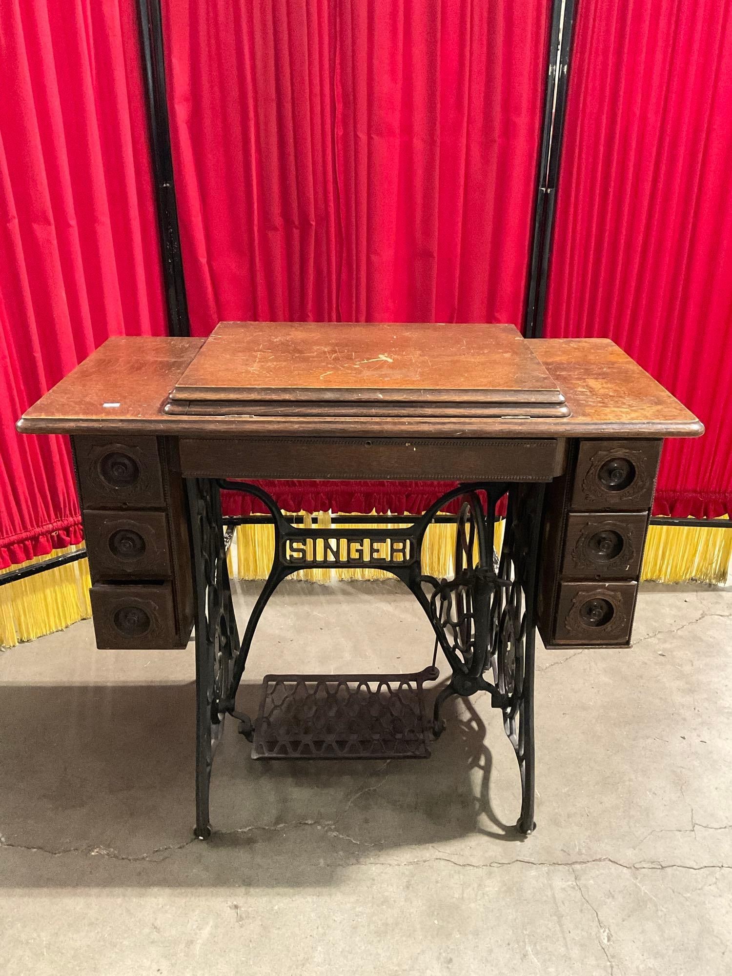 Antique Singer Tiger Oak Sewing Cabinet w/ Treadle & 7 Drawers. No Sewing Machine. See pics.: Antique Singer Tiger Oak Sewing Cabinet w/ Treadle & 7 Drawers. No Sewing Machine. As Is, condition is otherwise fair to good. Measures 36" x 31" DM-2698