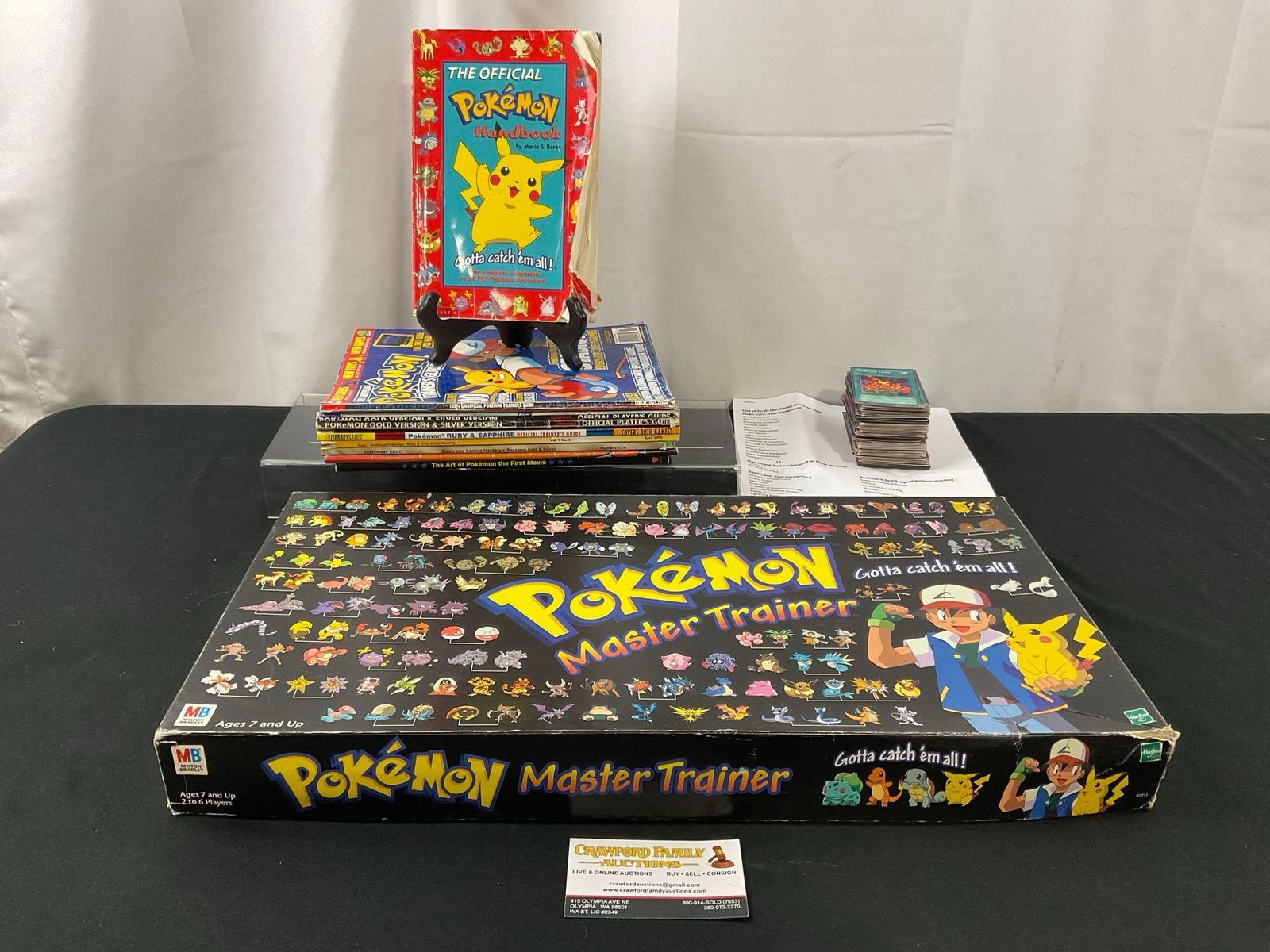 Pokemon Master Trainer Board Game, Handbooks, & 165 Yu-Gi-Oh cards w/ list of cards (1 of 4)