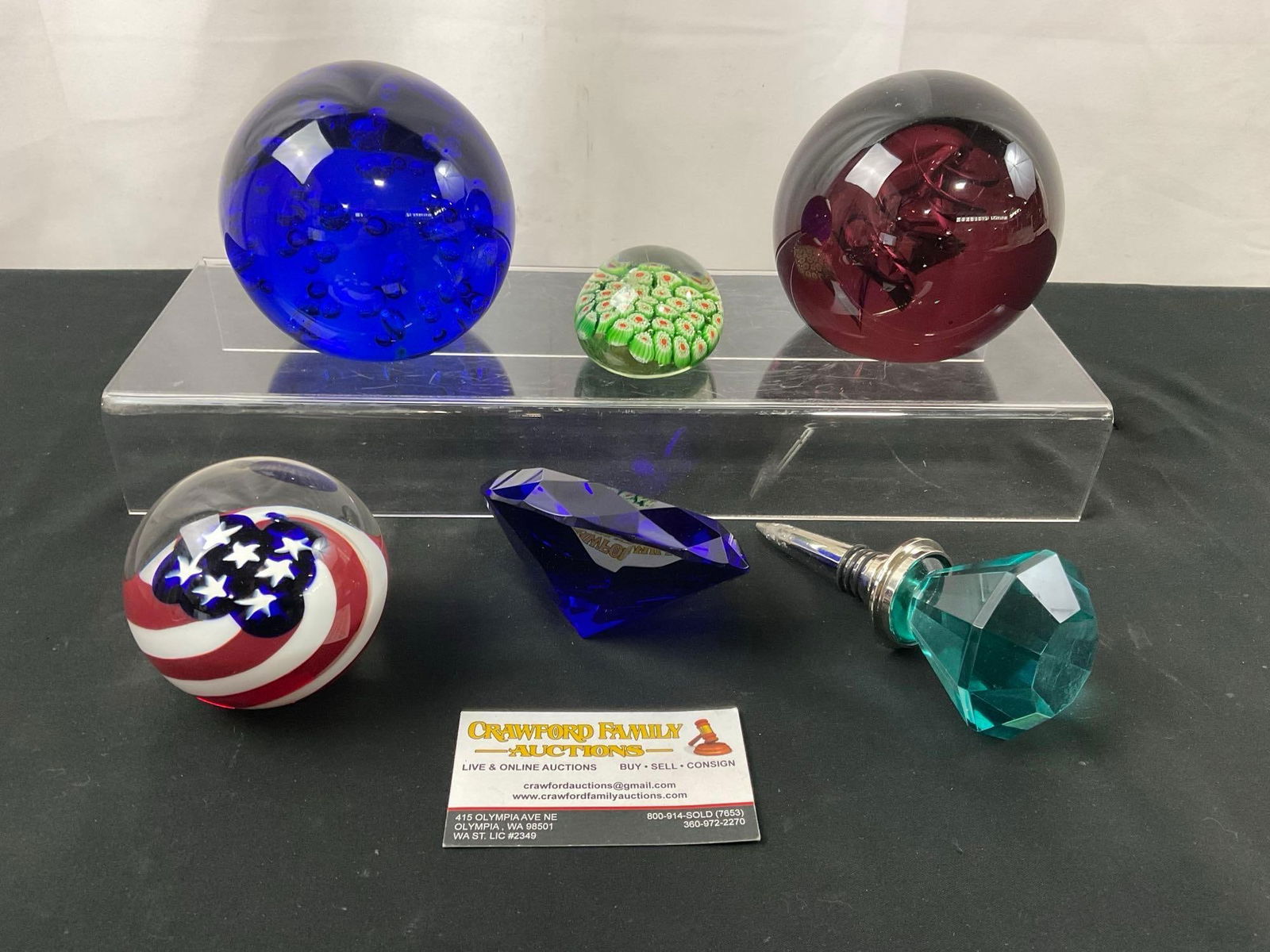 5 Paperweights, Millefiori, Bubbles, Old Glory, Blue Glass Diamond, Sky Blue Gem Wine Stopper: Appears to be in good shape. The pair of larger paperweights measure about 3.5 inches in diameter. See pics. E-2701