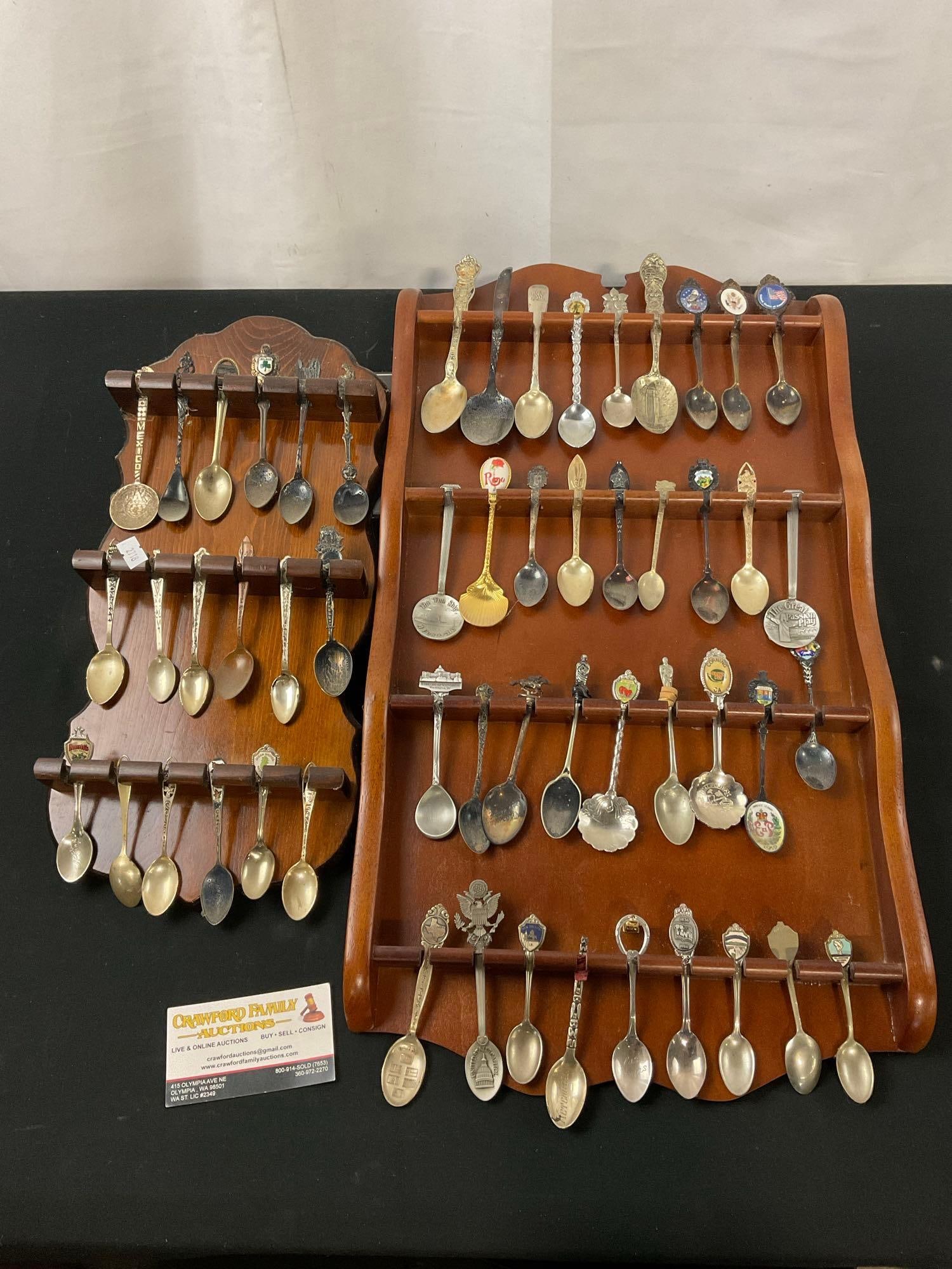 Pair of Collectible Spoon Holders with a variety of Spoons incl. some Sterling pieces: The spoons are unresearched, a couple are pictured as sterling. The larger wall hanging measures approx 22h x 12w inches. See pics. E-2718