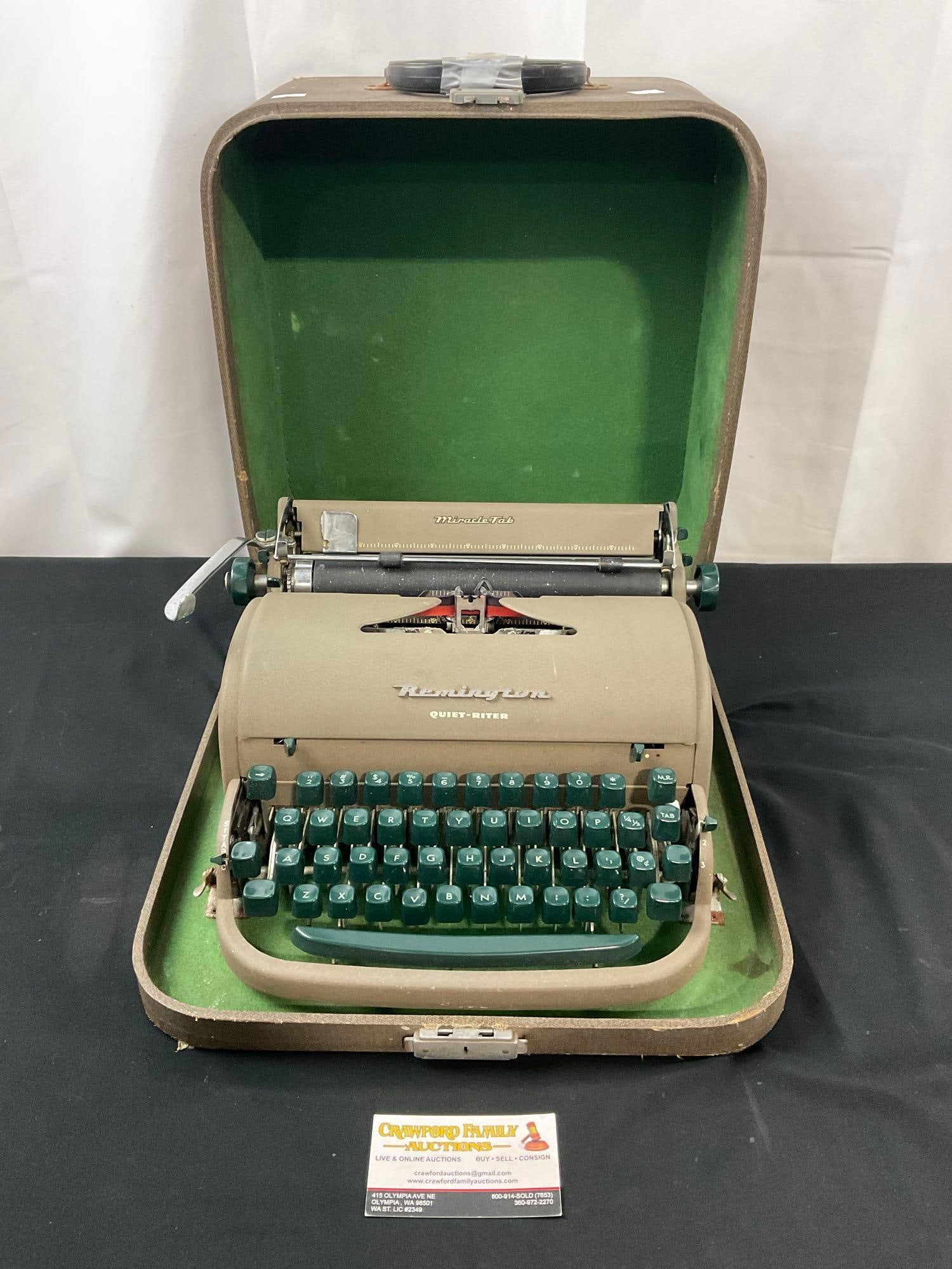 Vintage 1951 Remington Portable Quiet Riter w/ Miracle Tab in Grey Case: Serial number: QT2205285,which means the piece was made in 1951. Needs servicing for regular use. Appears to be in good shape. The case measures approx 7h x 14w x 15d inches. See pics. E-2722