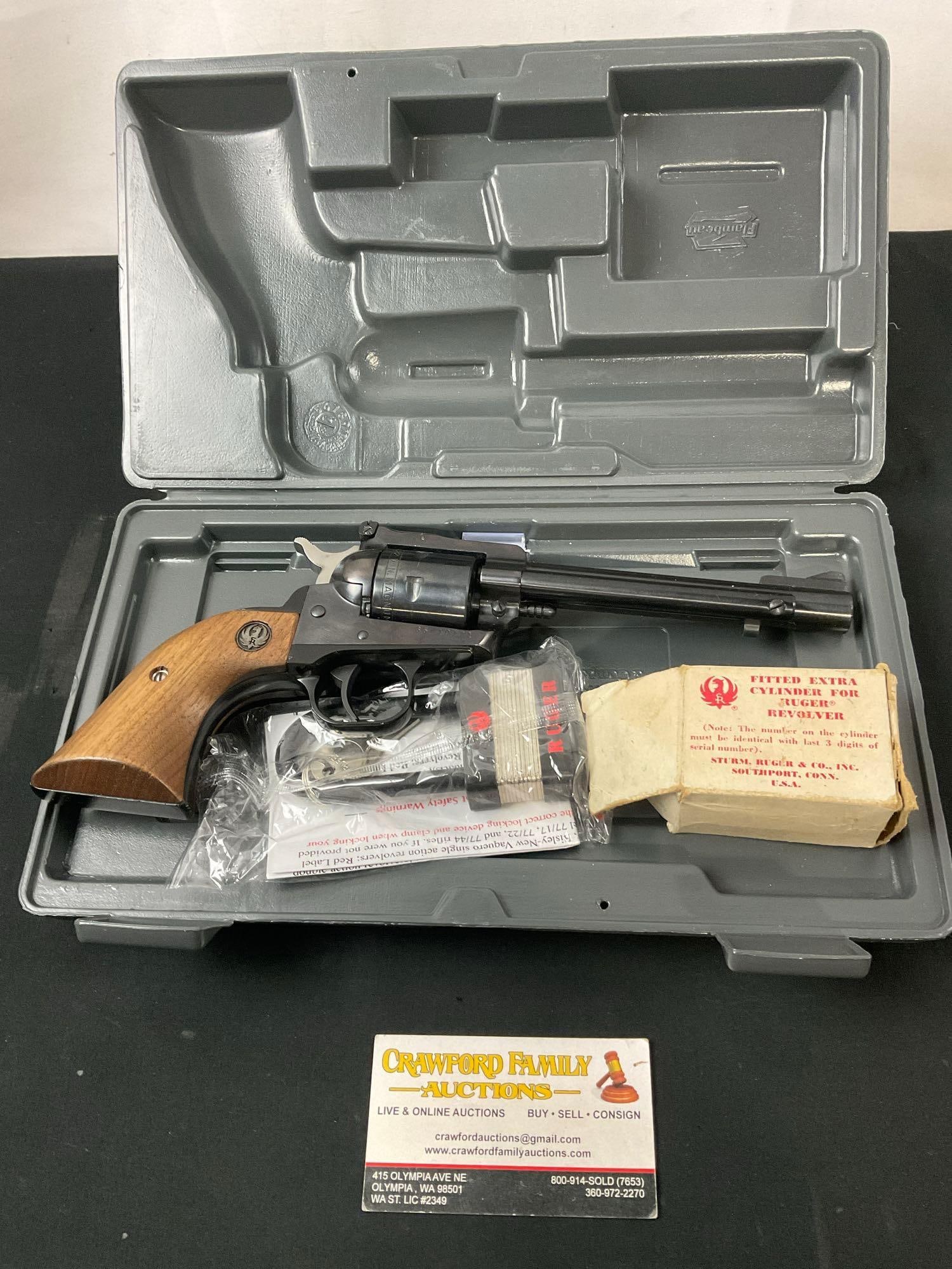 Ruger New Model Single-Six .22 Cal Revolver, w/ LR & Magnum Cylinders, Blued Finish, SN:65-10171 ...: SN:65-10171. Appears to be in great shape, likely never fired. The total length is about 11 inches. The barrel is 5.25 inches. See pics. E-2930A Approx Manufacture date 2008/09
