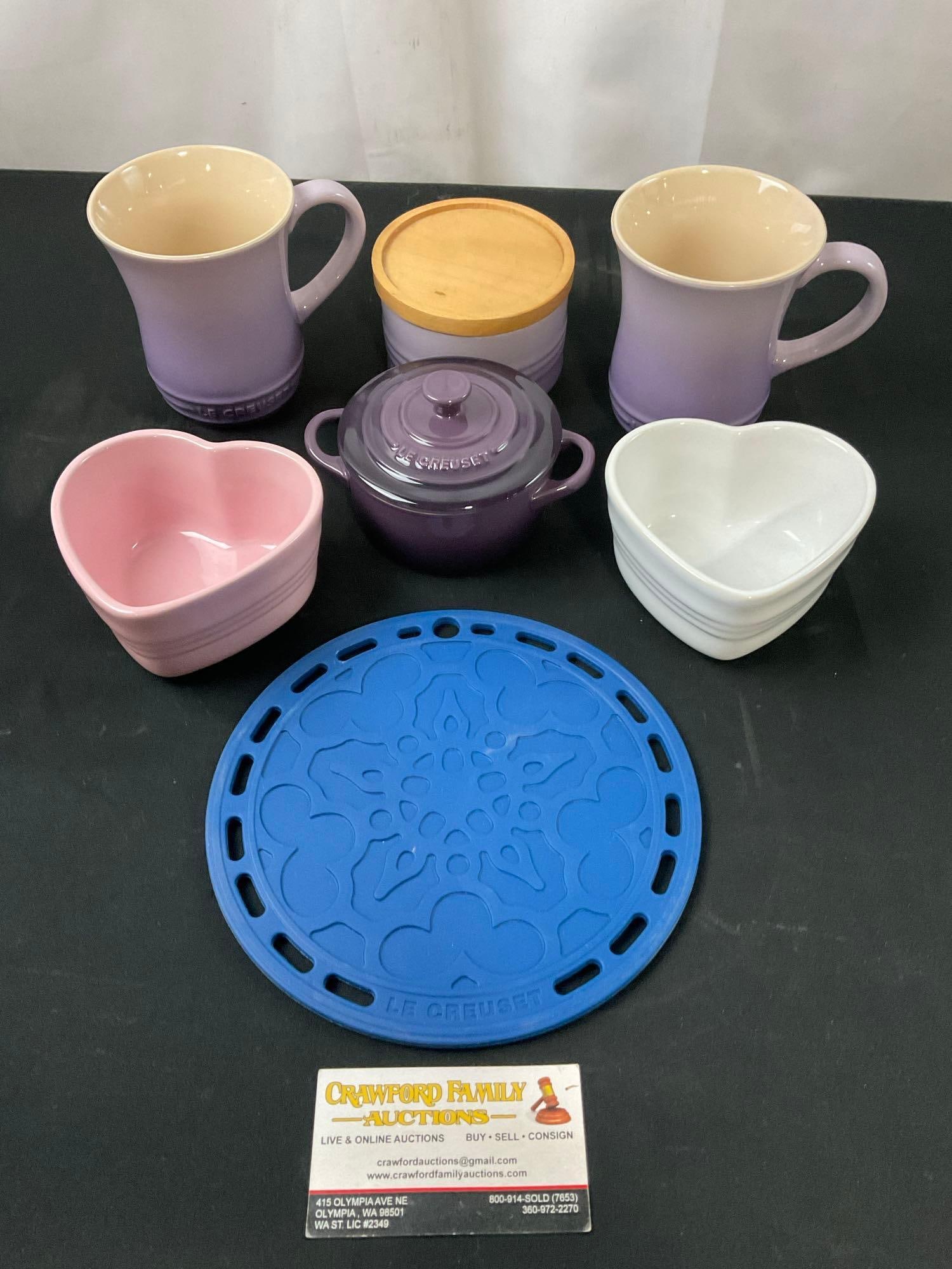 Assorted Le Creuset Pieces, pair of Heart shaped bowls, 2 mugs, sugar, Small pot & Rubber Trivet: Appears to be in good shape. See pics. E-2940