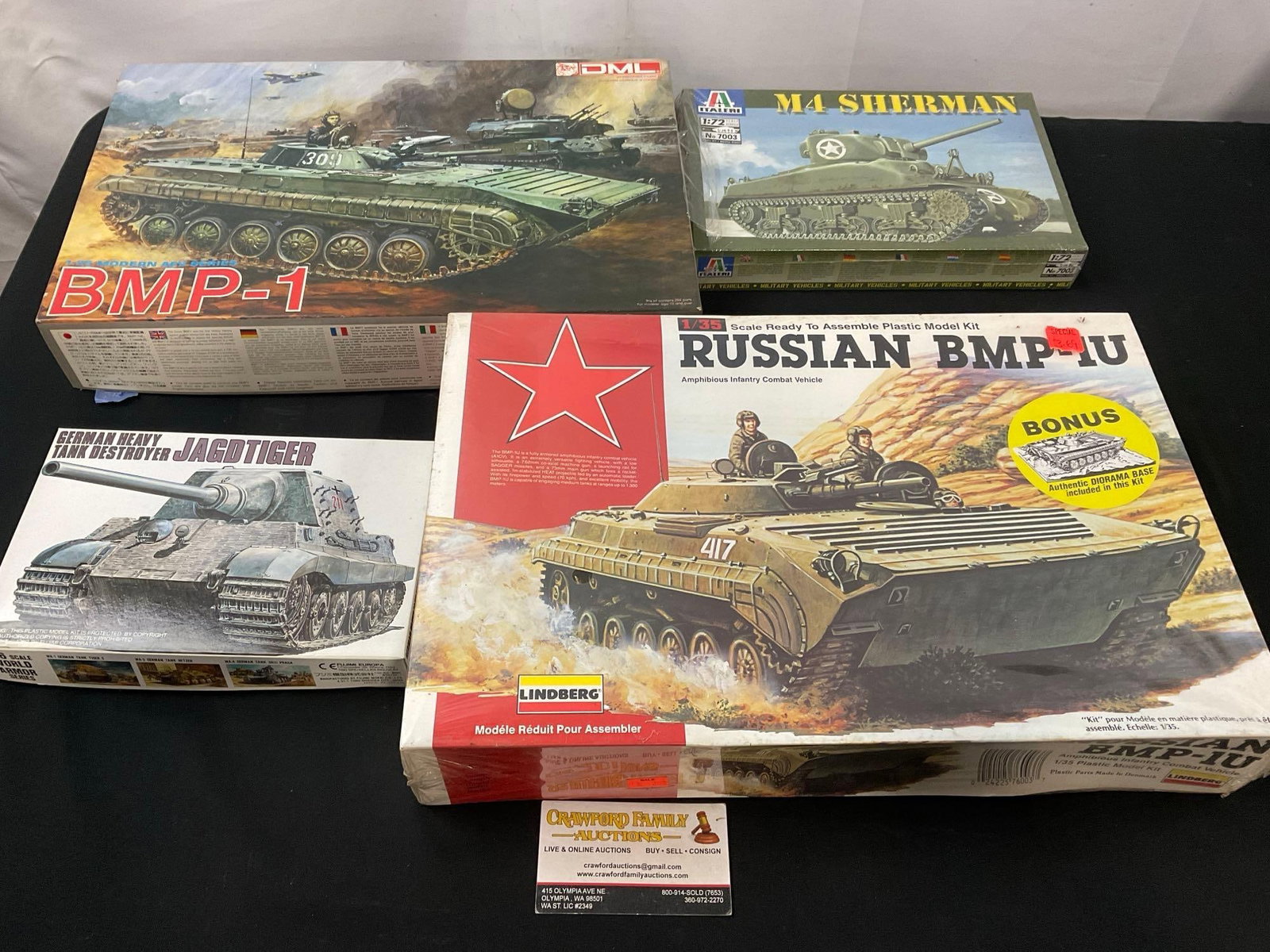 4x Tank Model Kits, Dragon BMP-1, Lindberg BMP-1U, Italeri M4 Sherman & Fujimi Jagdtiger: Appears to be in good shape. The boxes are mostly open, cannot verify 100% of the pieces are included, sold as is. See pics. E-2960
