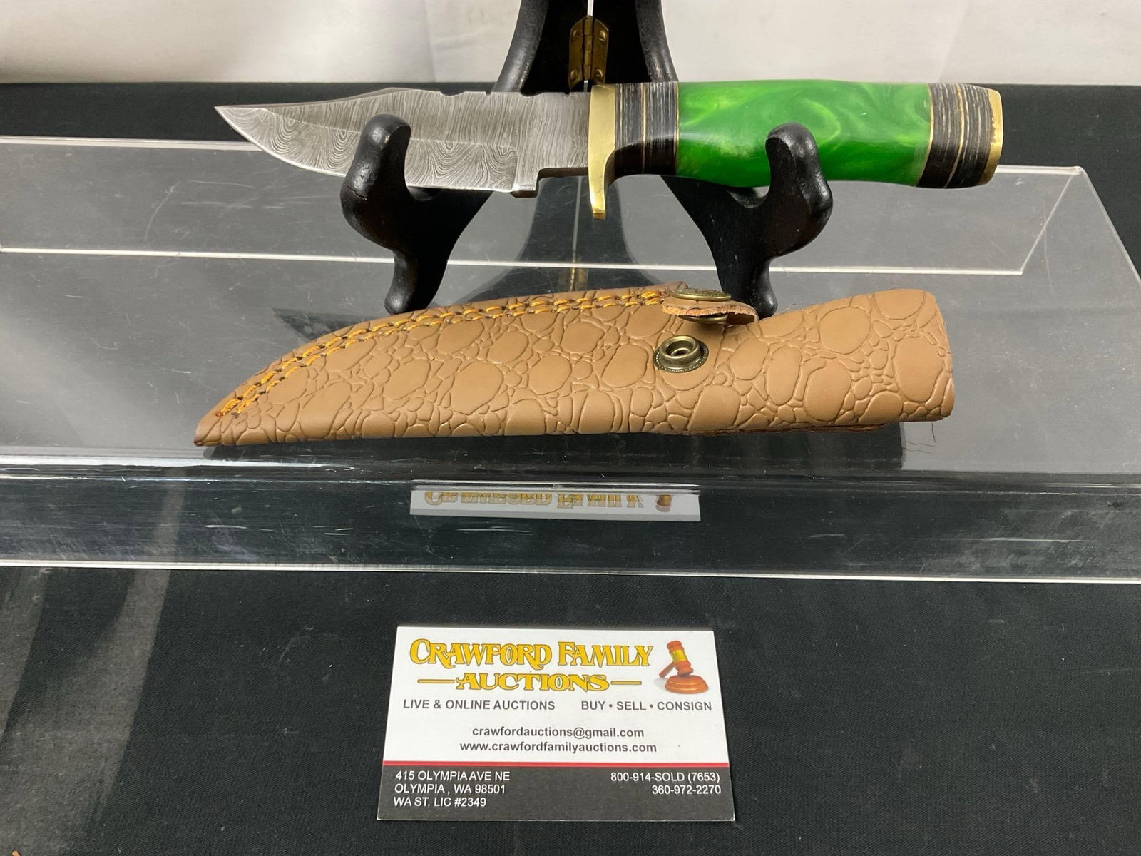 Handmade Damascus Steel Knife w/ Green Resin Handle & Custom Leather Sheath, 4.5 inch blade: Made from several layers of 1095 and 15N20 steel folded multiple times creating between 288 and 512 layers to form unique patterns in the blades. Each handle is custom fit as are the sheaths. Approx 4