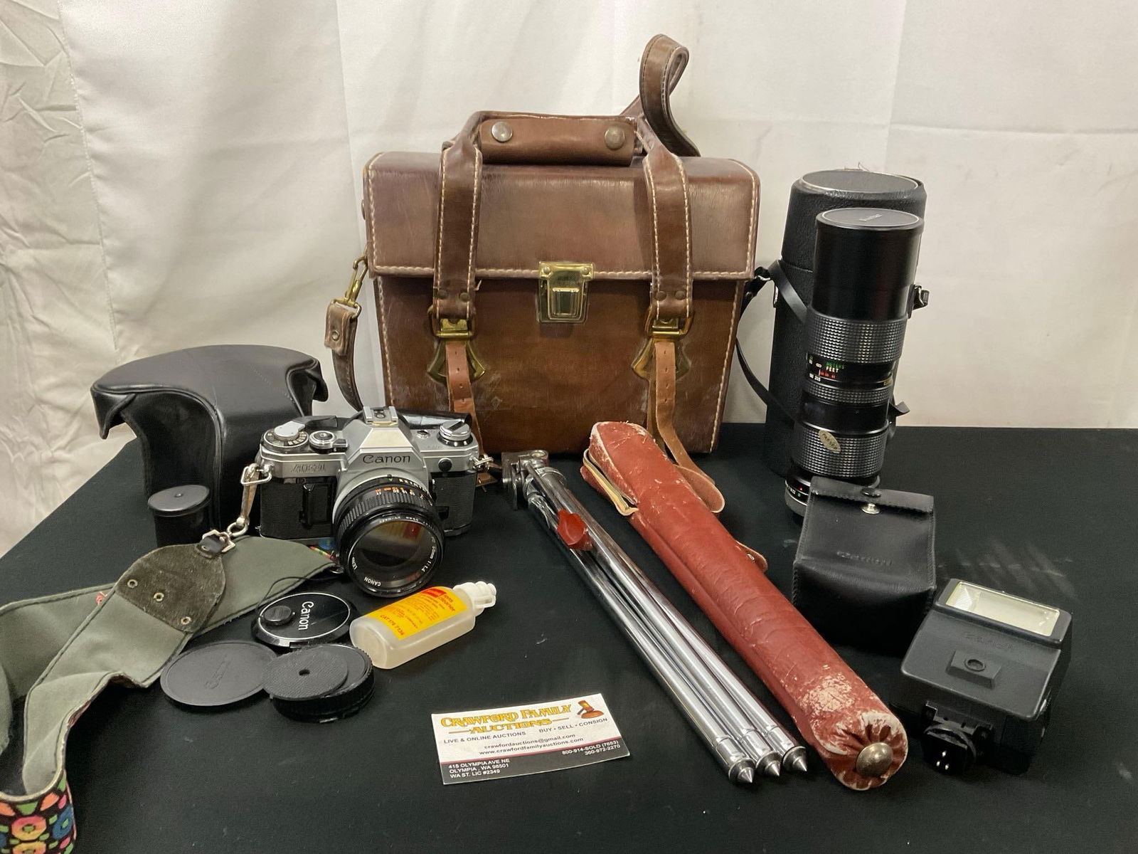Vintage Canon AE-1 w/ 50mm Lens, Leather Case, massive 85-205mm lens, Tripod, and accessories (1 of 8)