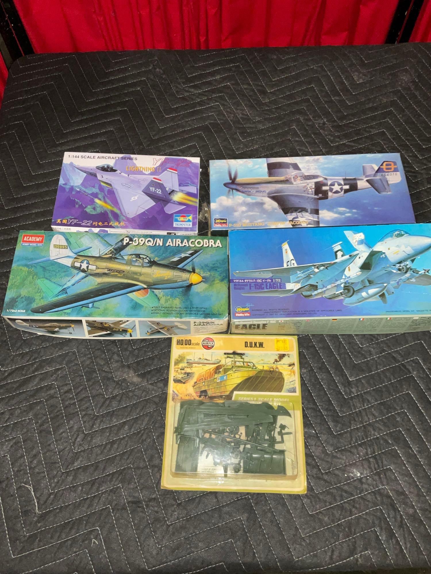 Collection of 5 Model Kits - Mainly Air Craft - Includes Airacobra, F-15C Eagle, YF-22, & P-51D (1 of 4)