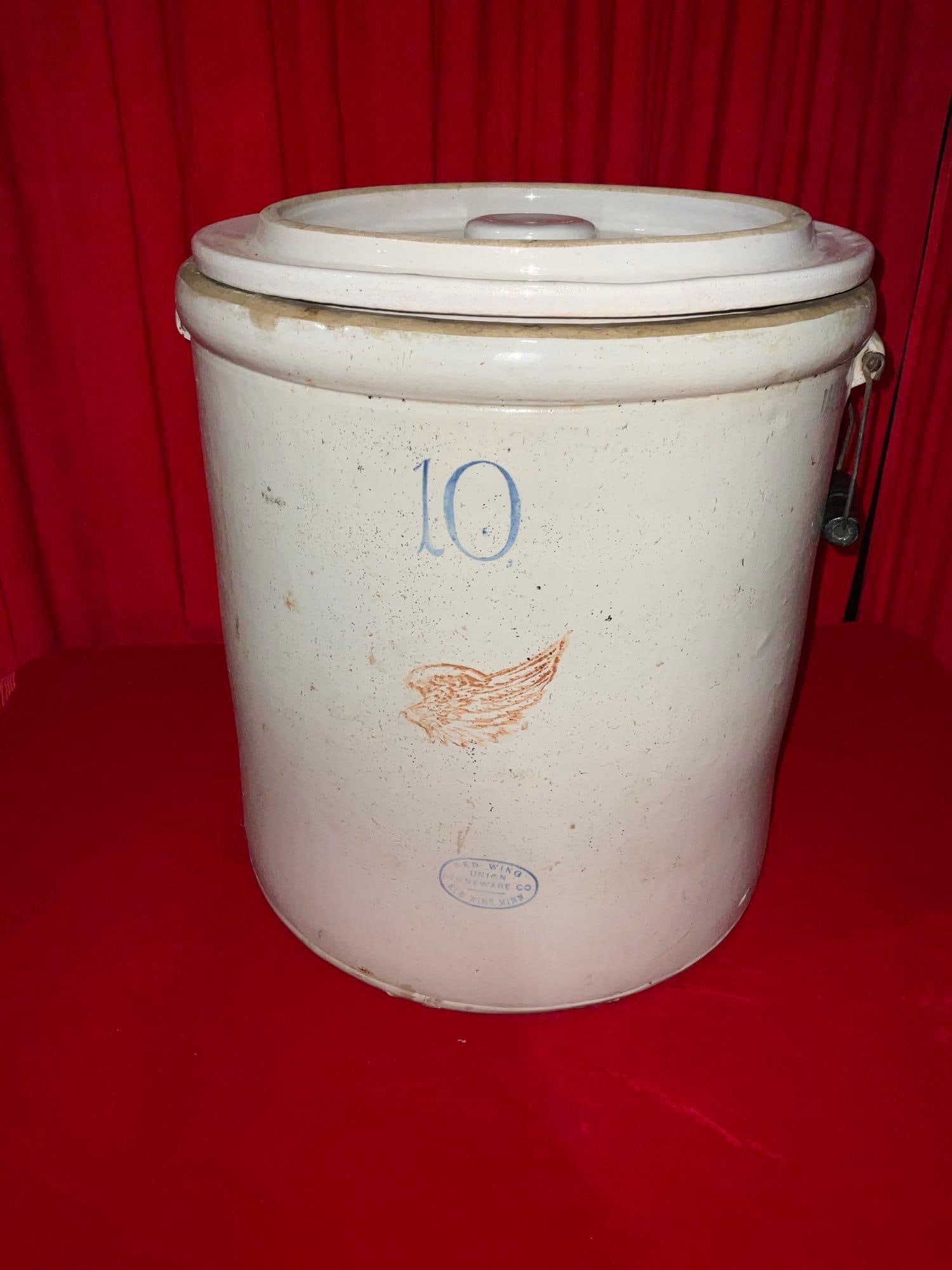 Red Wing Union Stoneware Co. 10 Gallon Crock w/ Original Lid & Handle - See pics: Crock is in great shape. Minor wear no real cracks. Nice piece! Measures 18"x16"x16". T-3190 *Special Shipping Required*