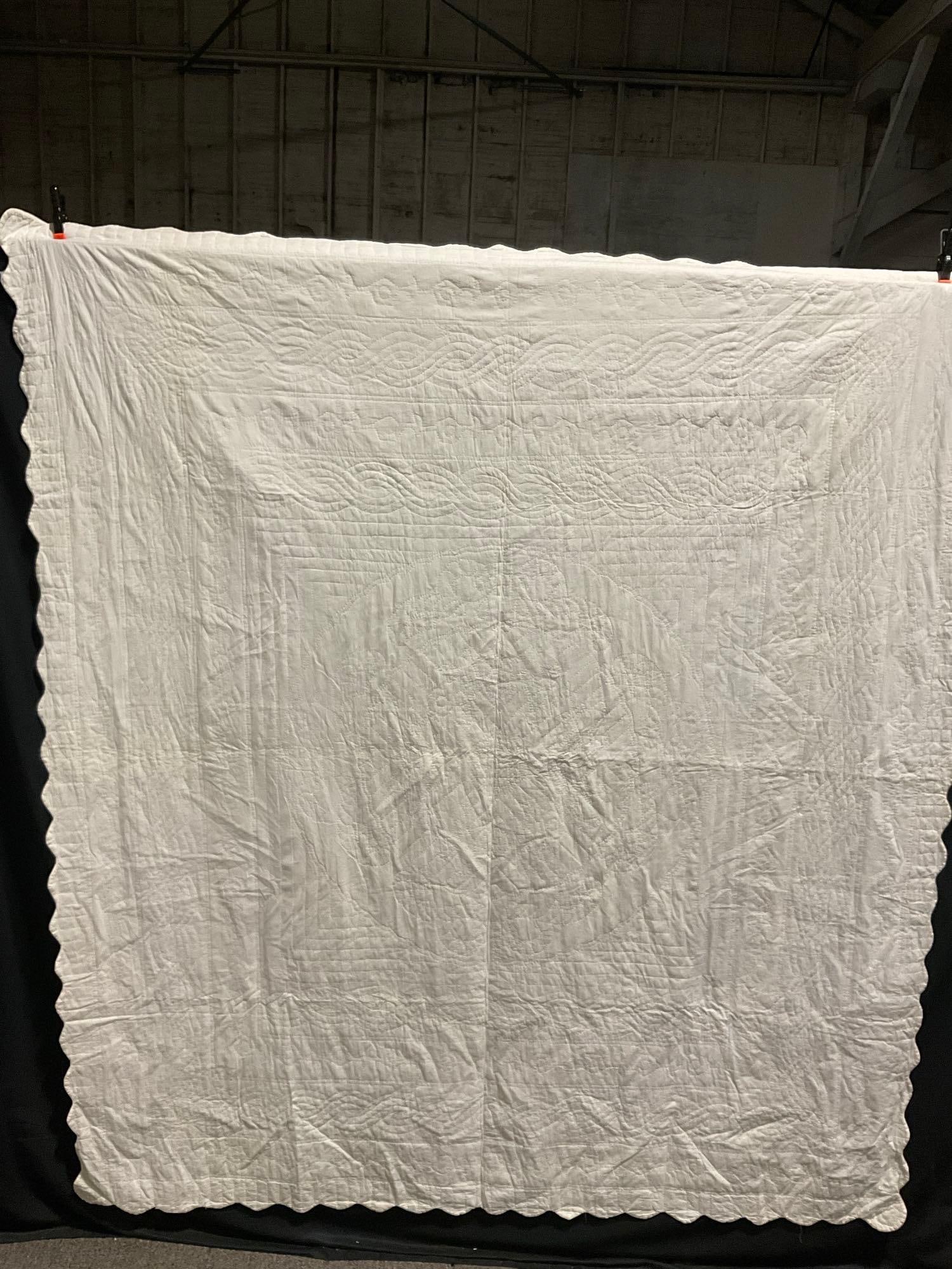 Blank Handmade Quilt, measures 84 x 94, covered in decorative stitches: Consignor says the pieces are handmade, some made locally and some purchased. Appears to be in good shape. The outside dimensions measures approx 84 x 94 inches. See pics. E-3190