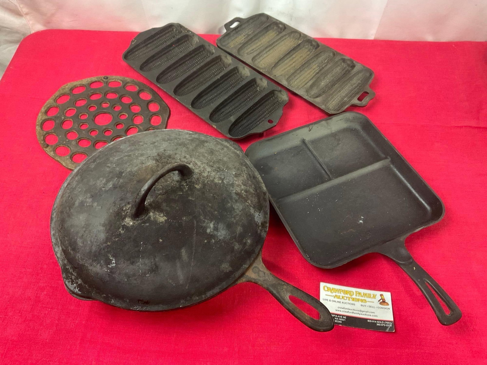 Collection of Cast Iron, Pair of Cornbread Trays, Bacon & Egg Skillet, #8 Pan w/ Lid, & Trivet: One of the cornbread trays is marked Griswold no.273. Appears to be in good shape. See pics. E-3190