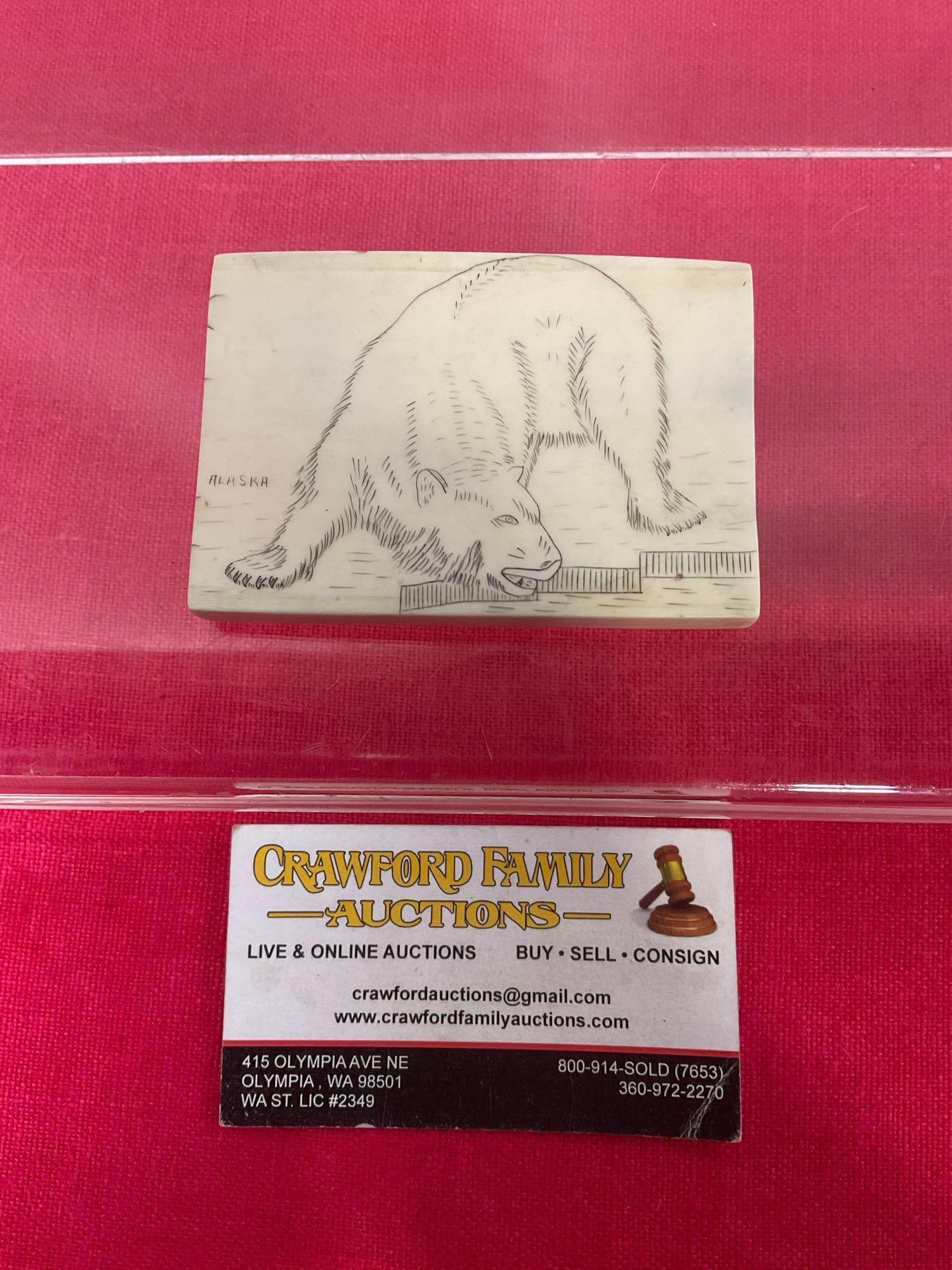 Antique Scrimshawed Alaskan fossilized Mastodon Tusk, by P.E. Kern Skagway Alaska , Found at Dawson: Rare Antique Circa 1900 piece by Peter E kern 1860-1937 Shows a polar bear, or perhaps a similar older beast. Appears to be in good shape. The piece measures approx 3 x 2 inches. These are