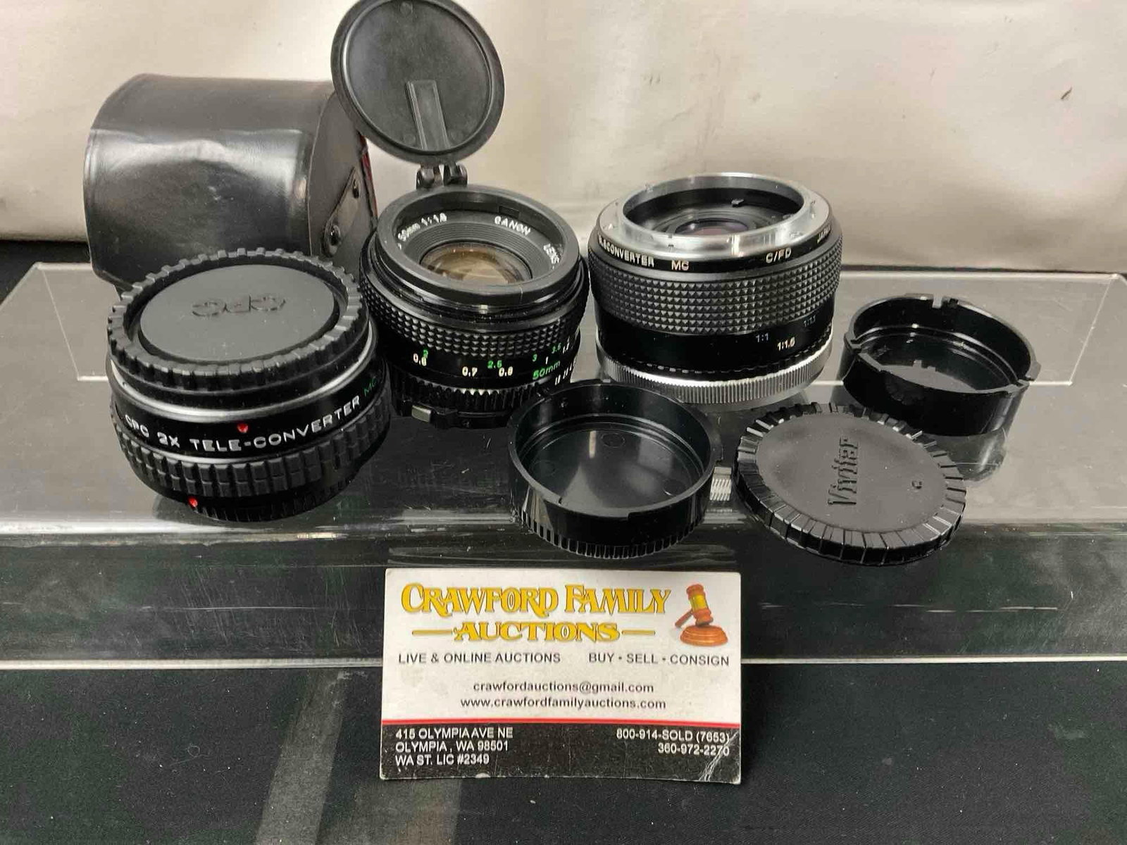 Canon FD 50mm Lens 1:1.8, CPC & Vivitar 2x Teleconverters, lens covers and leather case: Appears to be in good shape. The pieces seem to operate smoothly. See pics. E-414