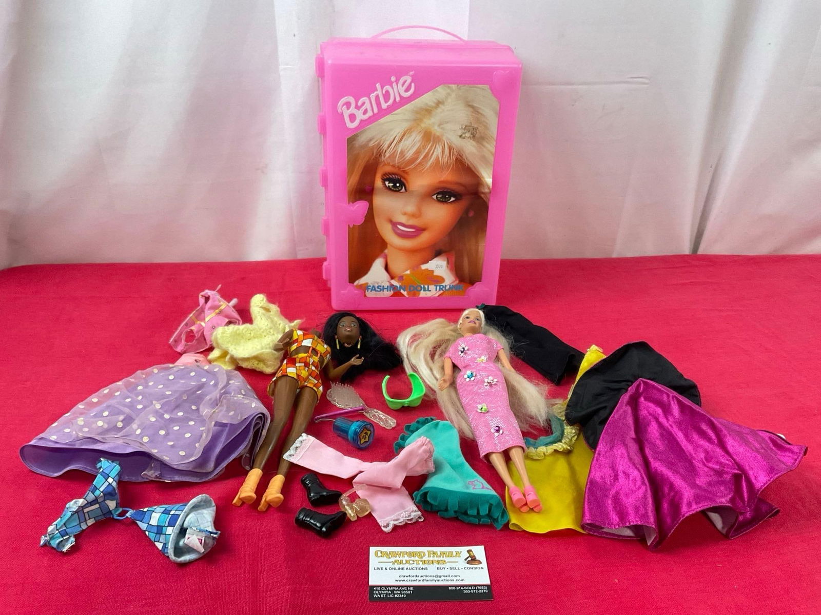 Vintage Barbie Fashion Doll Trunk, Pair of Barbies, and assortment of clothes and shoes: Appears to be in fair to good shape, one barbie has its head broken off at the neck, one is marked 1990 & the other is 1999. The barbies measure approx 10-11 inches. See pics. E-3570
