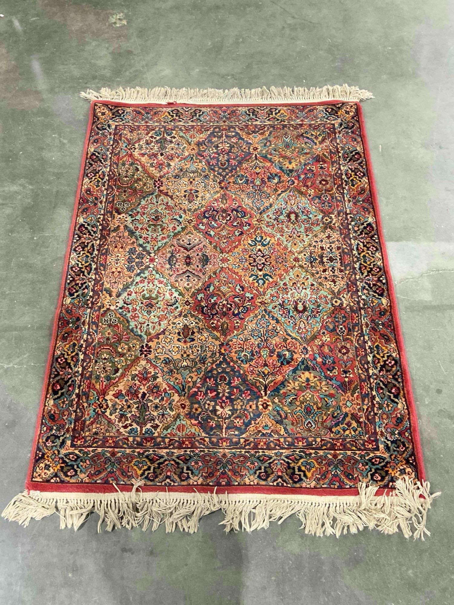 Beautiful Jewel Toned Wool Area Rug w/ Floral Diamond Pattern. Measures 52" x 80" See pics. (1 of 4)