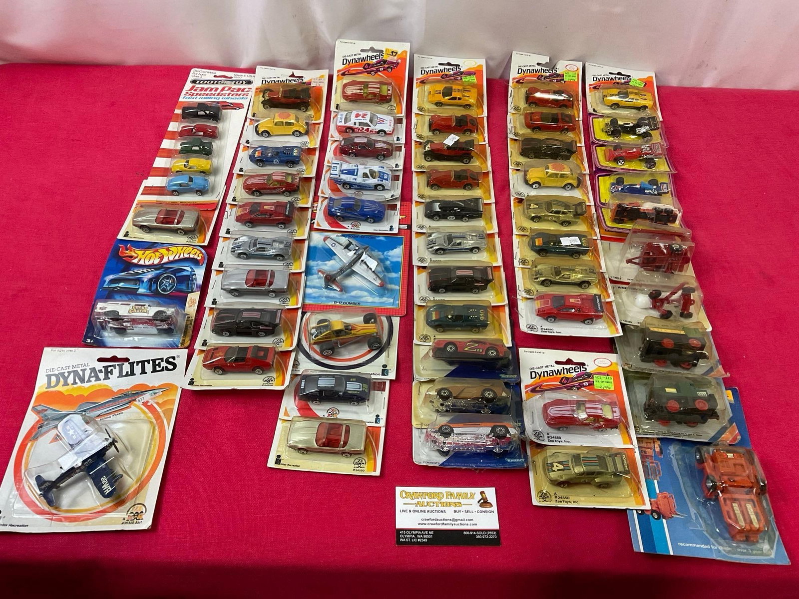 Diecast Toy Cars in packaging, Dynawheels, Dyna-Flites, Kenner & some other brands, 53 pieces: Appears to be in fair to good shape. Most in the intact packaging, though they all have been stapled together, some staples taken apart for pictures. See pics. E-3190
