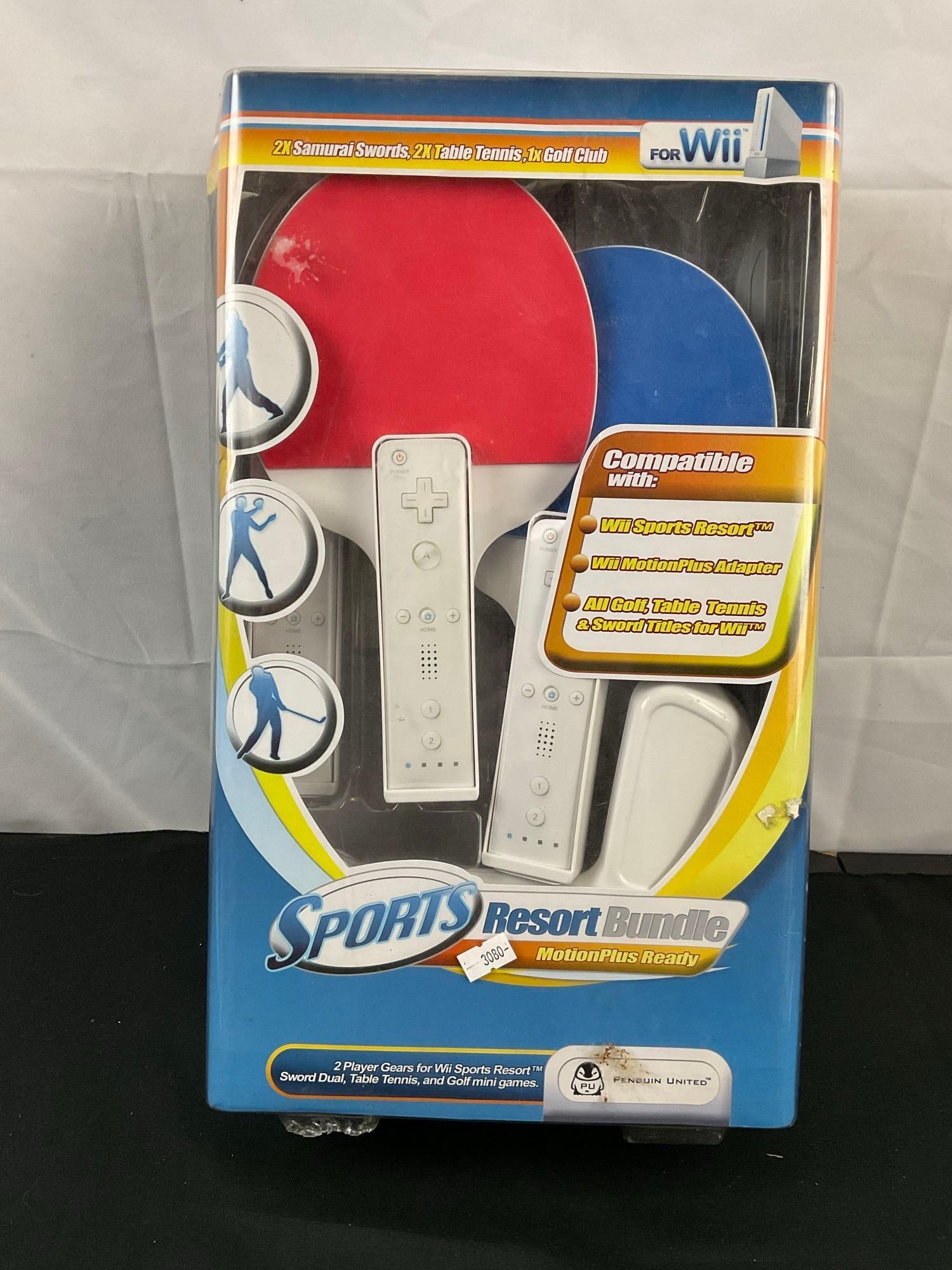 Wii Sports Resort Bundle includes 2x Samurai Swords, 2x Table Tennis, & 1x Golf club (1 of 4)