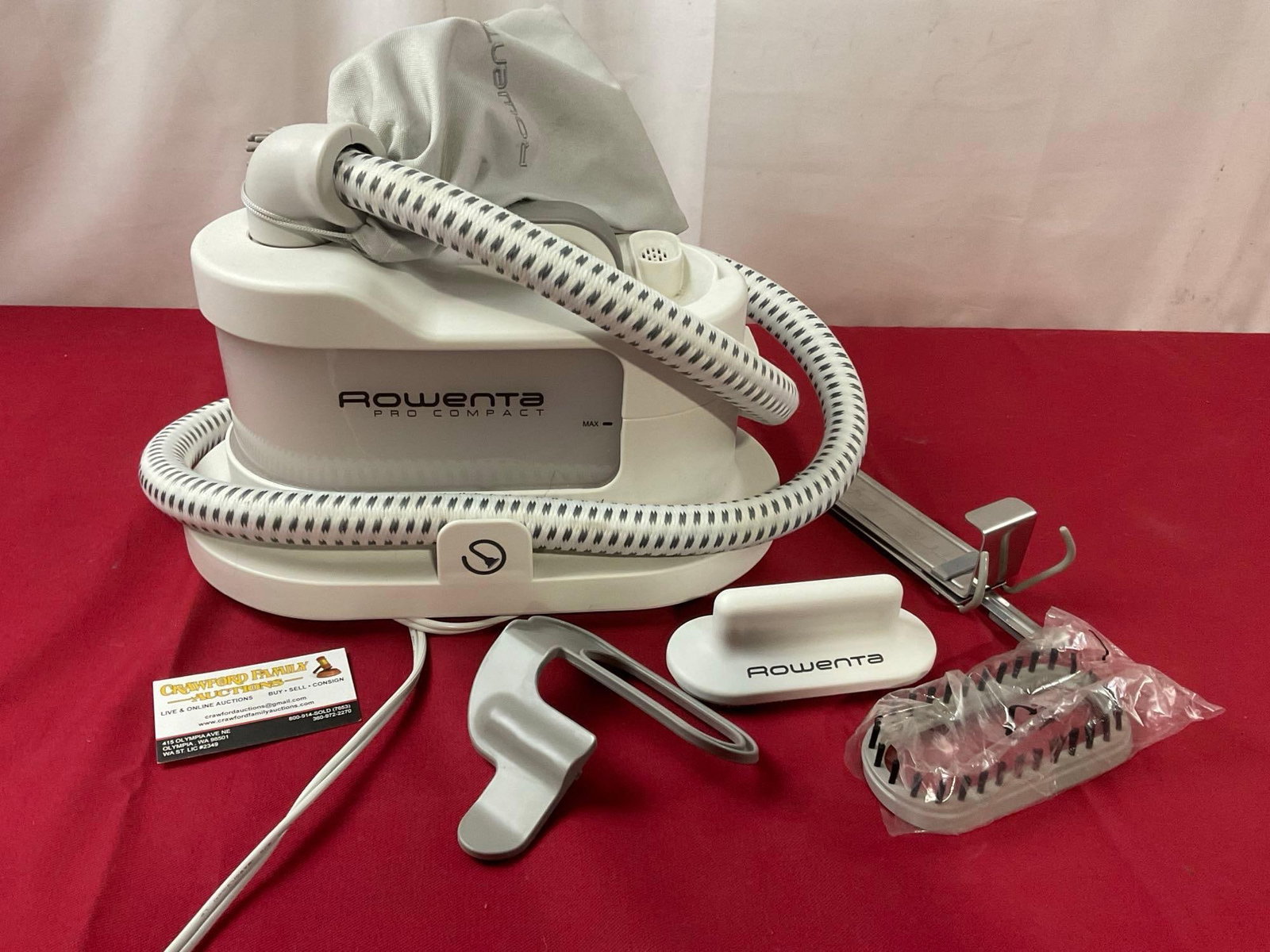 Rowenta IS1430 Pro Compact Garment and Fabric Steamer with Accessories: Appears to be in good shape, tested and powers on. The piece measures approx 8 x 13 x 7 inches. See pics. E-3830