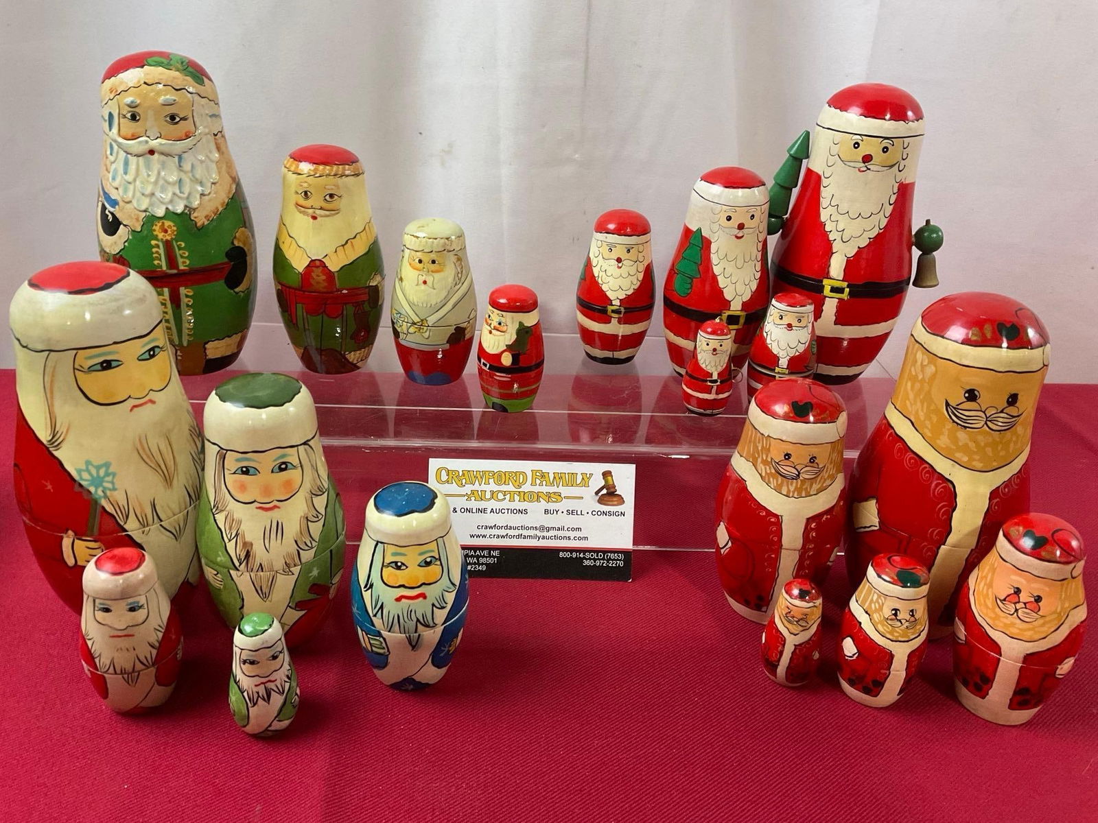 Assortment of Handpainted Wooden Santa Nesting Dolls, 4 sets, 19 total pieces: Appears to be in good shape. The tallest piece measures approx 6.5 inches. See pics. E-3720